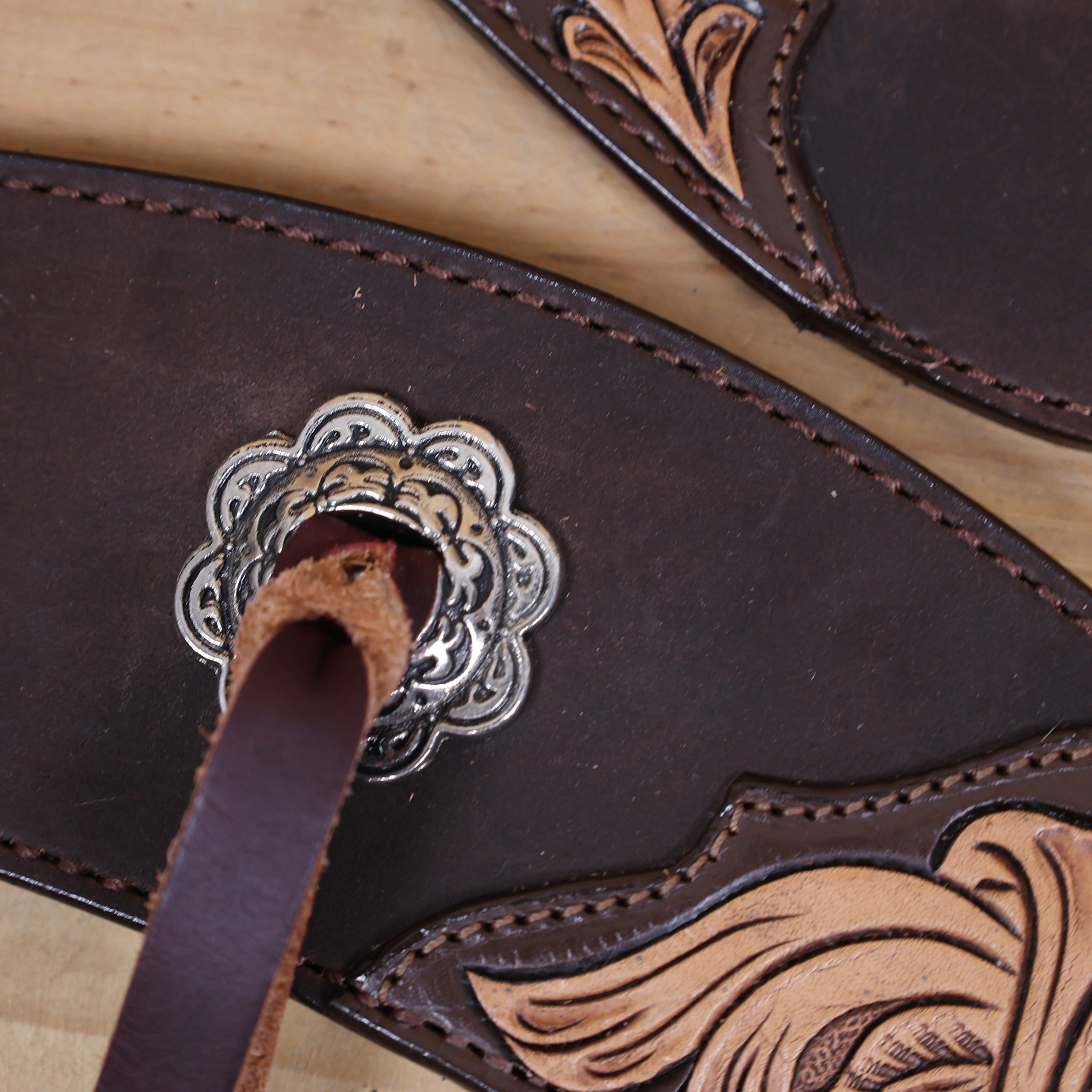 antique nickel slot conchos and burgundy leather accents