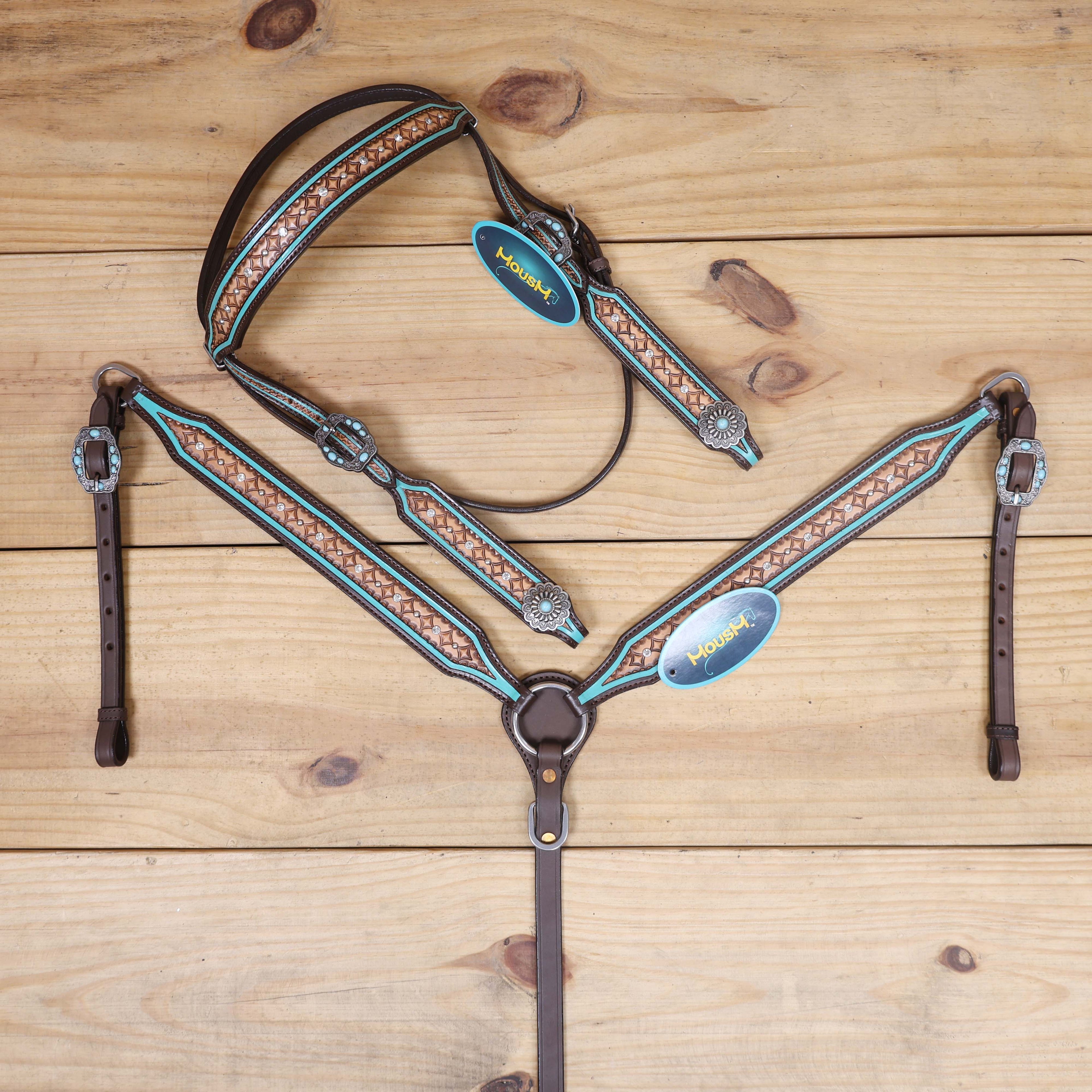 geometrical tooled western horse tack set with turquoise border detailing and sunburst conchos