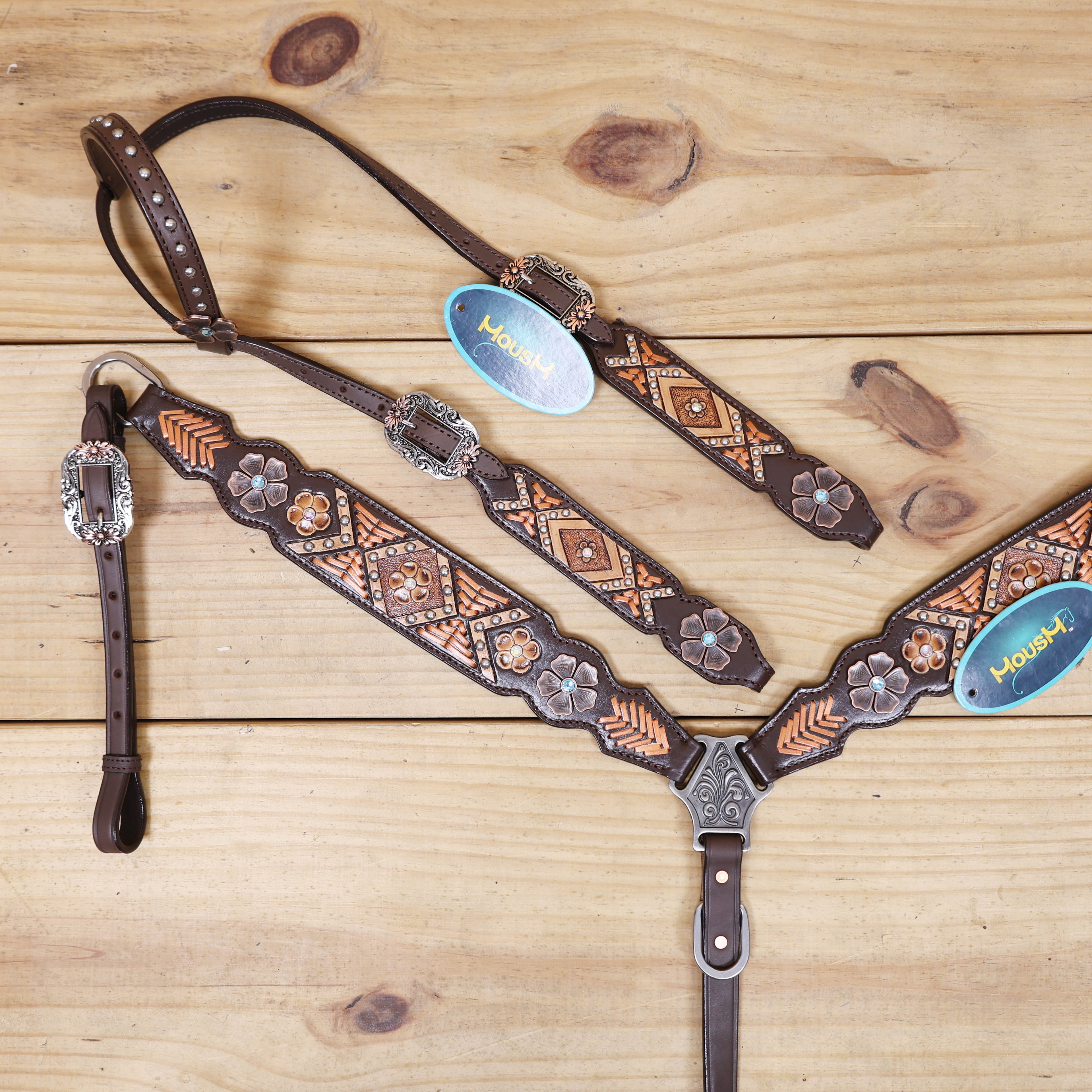 headstall tack set featuring beautiful rawhide braiding and geometric flower tooling