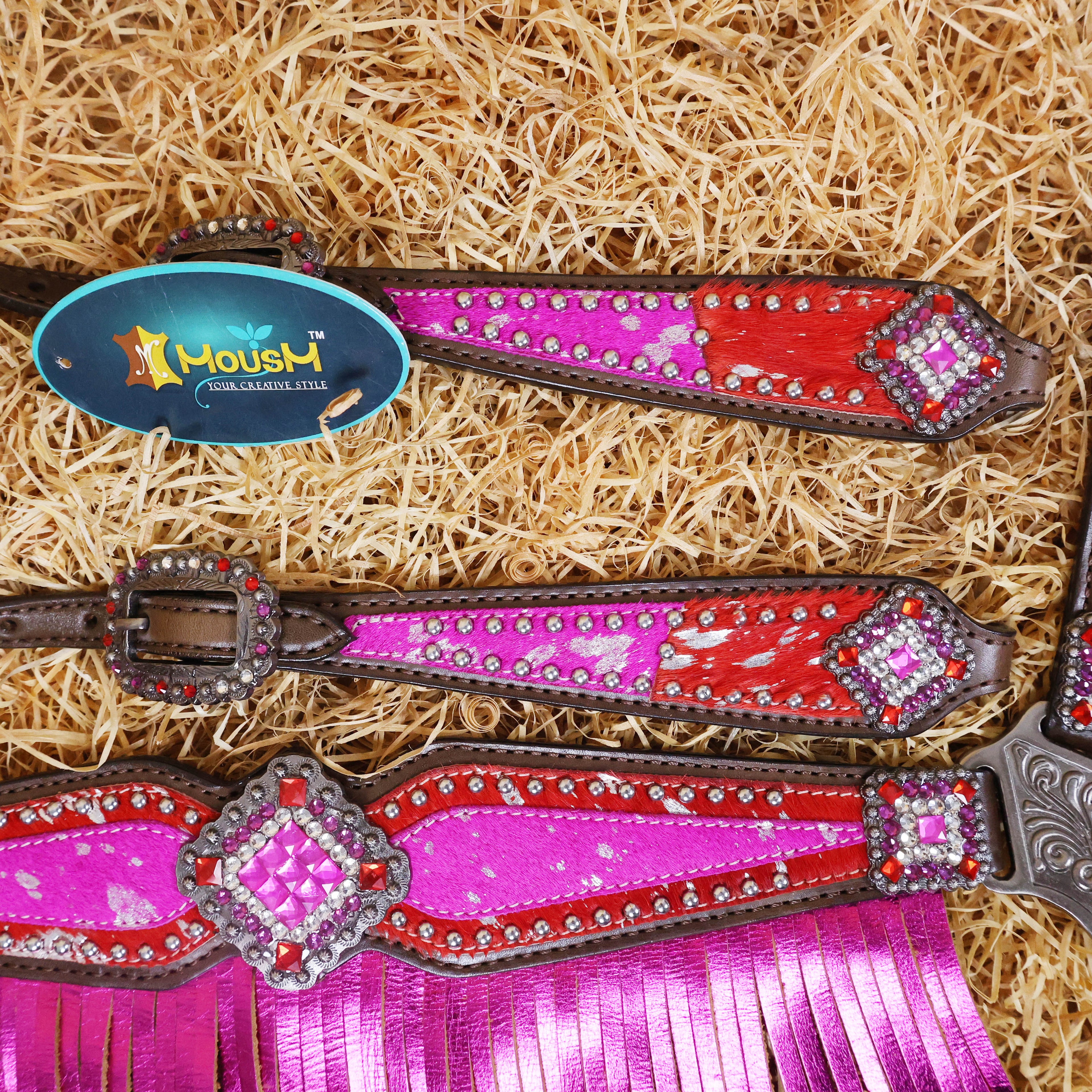 MOUSM Western Headstall and Breast Collar Set Decorated with Red-Pink Cowhide Inlay, Silver Patches Surrounded by Metal Beads, Matching Rhinestone Conchos, and Pink Metallic Leather Fringe