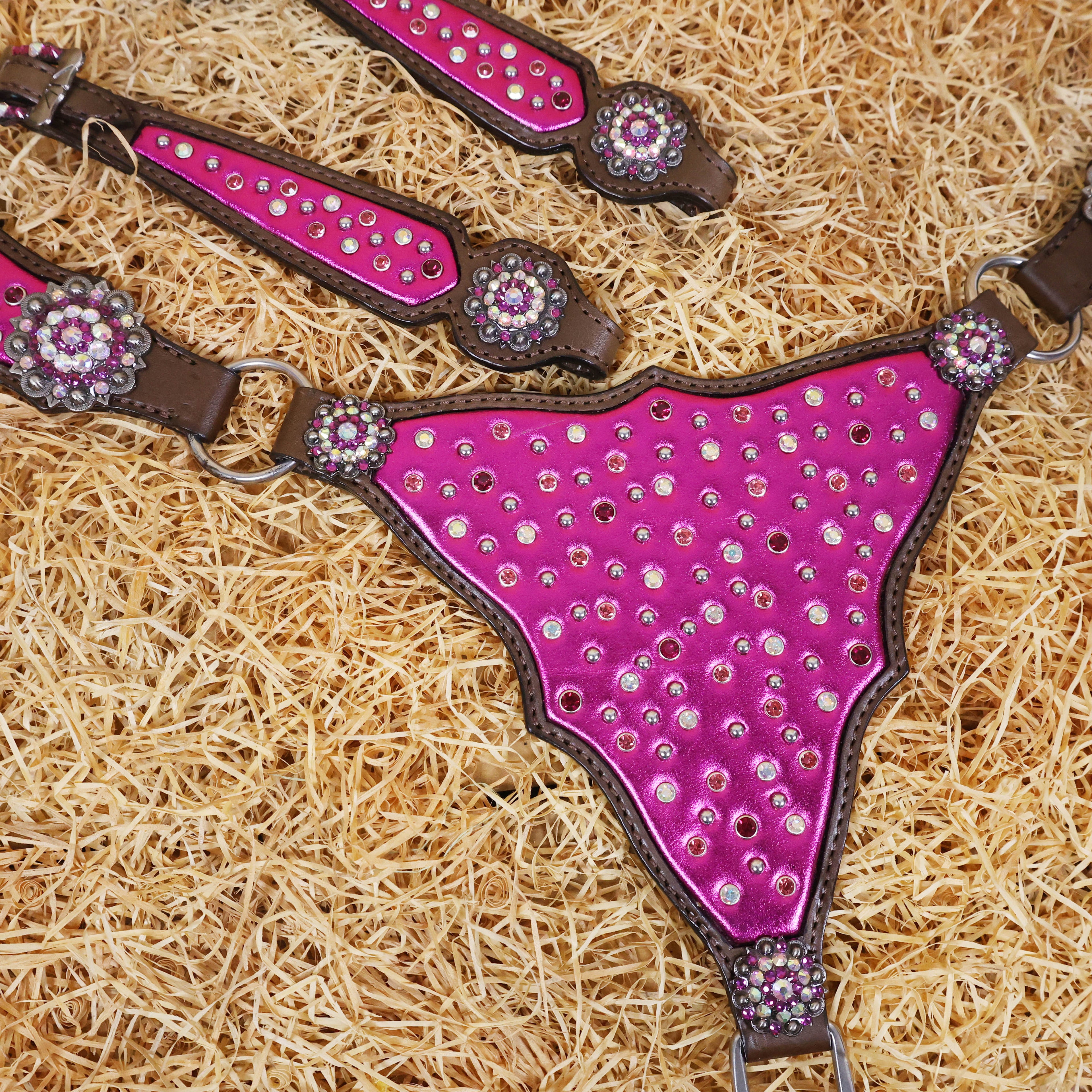 MOUSM Western Headstall and Breast Collar with Pink Gladiator Leather, Decorated with Red, White, and Orange Clear Stones, Surrounded by Matching Conchos and Buckles.