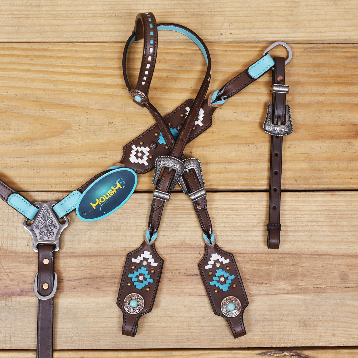 Western Leather Headstall and Breast Collar tack Set decorated with Aztec-style rawhide braiding on breast collar and cheek pieces, and twisted braided breast collar and cheek piece