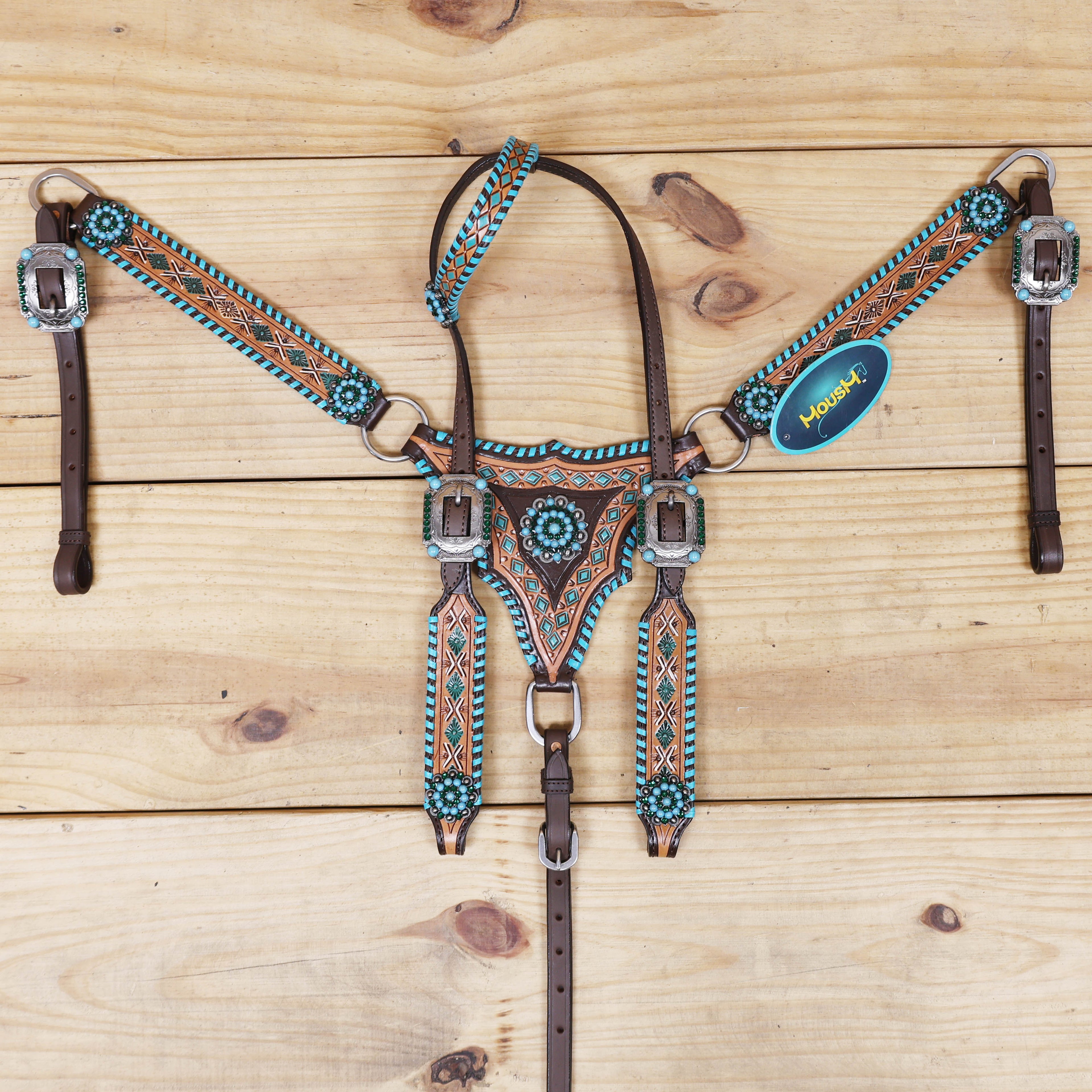western headstall set featuring one ear design with whip stitching along the edges and geometrical carving