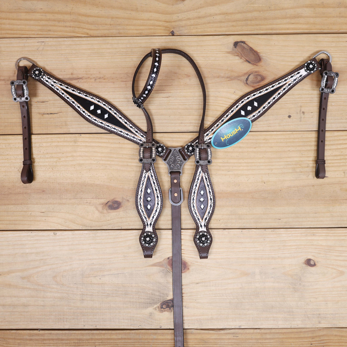western headstall with silver studs and rhinestone berry conchos with poker card style tooling