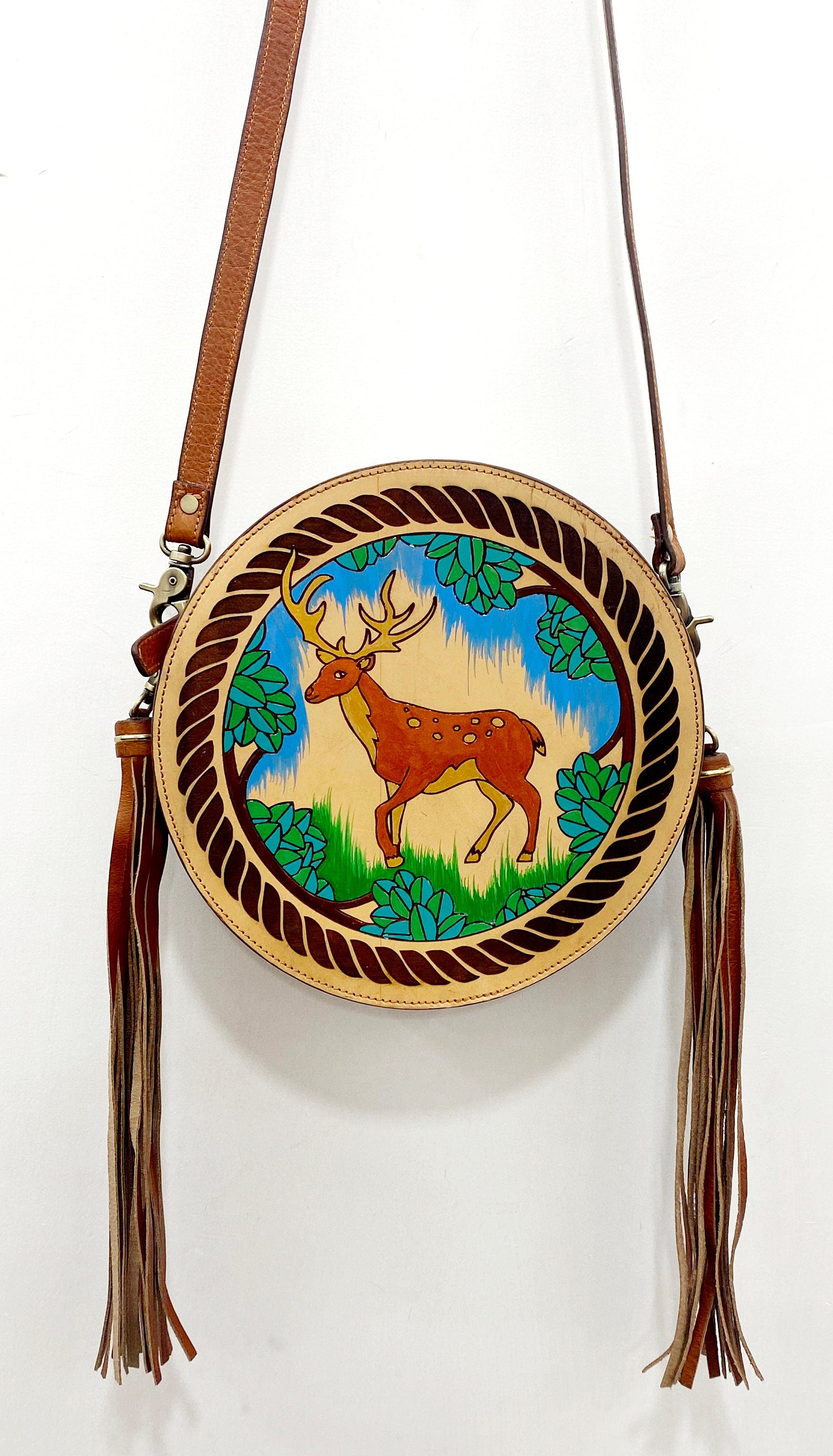 MOUSM Full Grain Cow Hide Leather Crossbody Bag - Small Round Ladies Bag Decorated with Hand-Painted Deer in Forest Carving with Rope Border & Leather Tassel Fringe, High-Quality Zipper Closure with Removable and Adjustable Strap