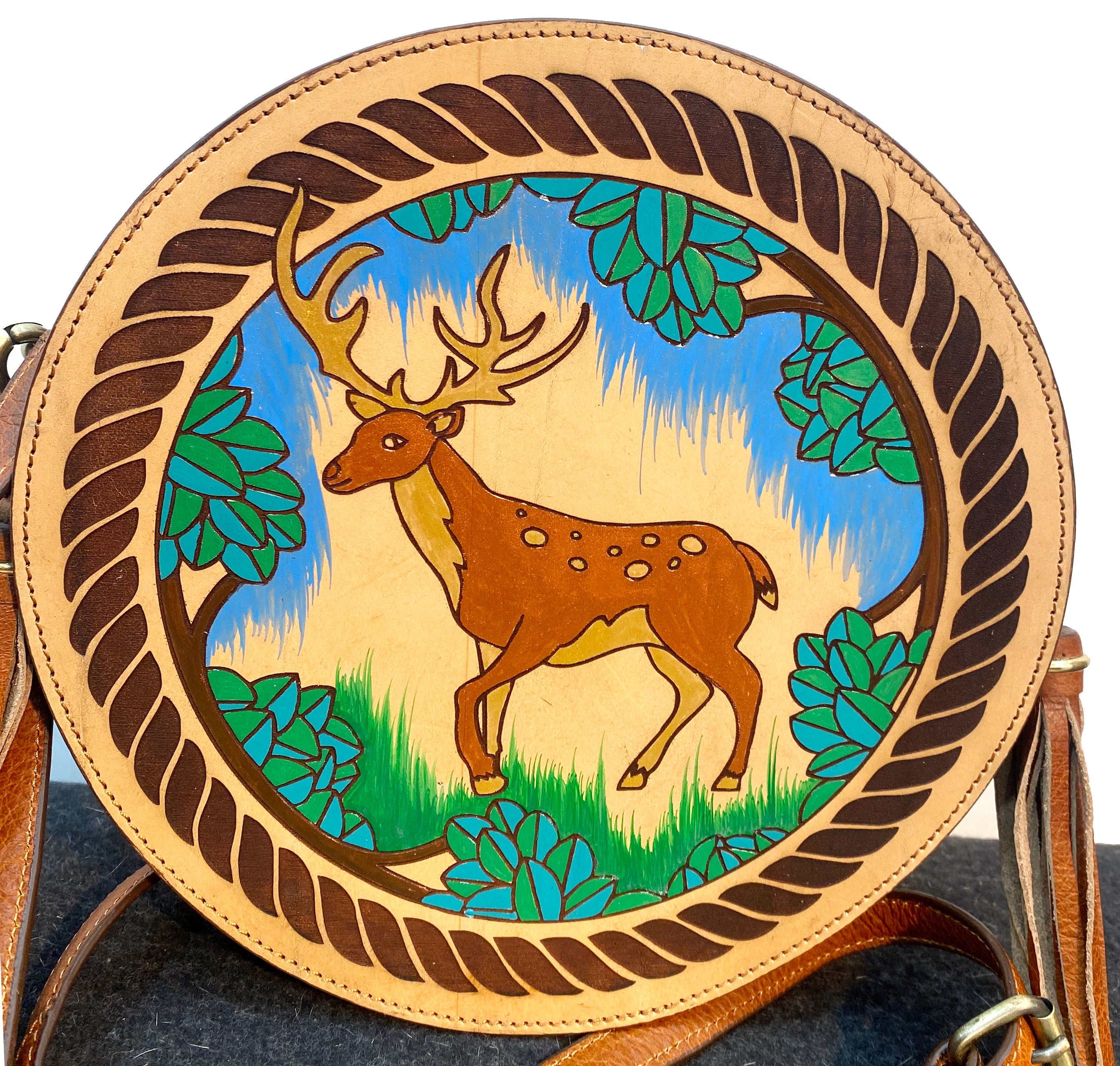 MOUSM Full Grain Cow Hide Leather Crossbody Bag - Small Round Ladies Bag Decorated with Hand-Painted Deer in Forest Carving with Rope Border & Leather Tassel Fringe, High-Quality Zipper Closure with Removable and Adjustable Strap