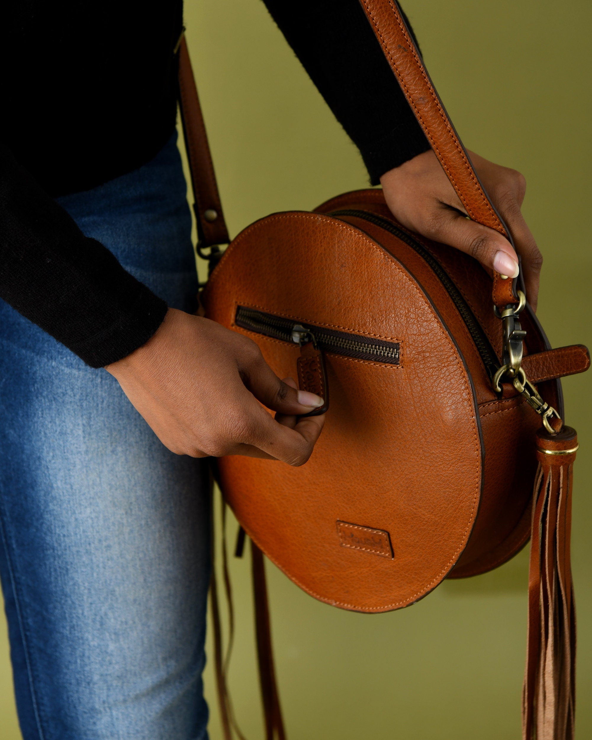 MOUSM Full Grain Cow Hide Leather Crossbody Bag - Small Round Ladies Bag Decorated with Hand-Painted Deer in Forest Carving with Rope Border & Leather Tassel Fringe, High-Quality Zipper Closure with Removable and Adjustable Strap