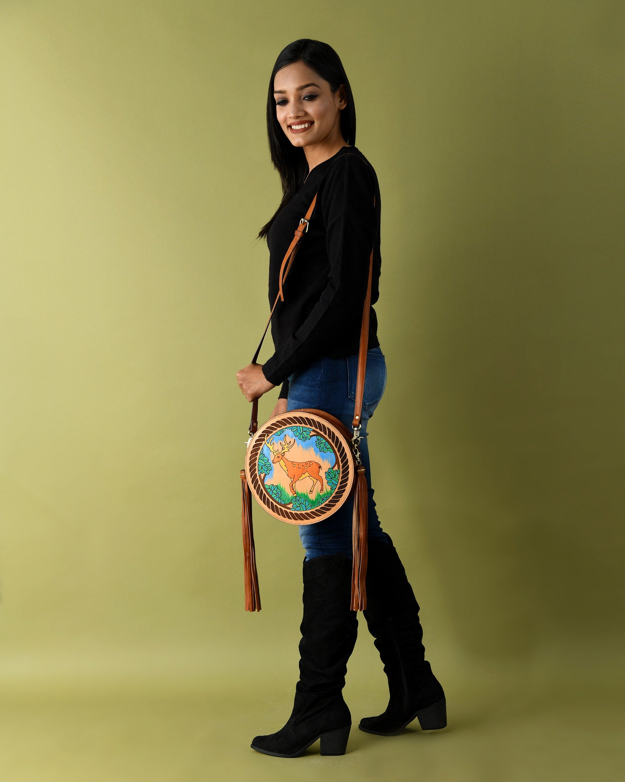 MOUSM Full Grain Cow Hide Leather Crossbody Bag - Small Round Ladies Bag Decorated with Hand-Painted Deer in Forest Carving with Rope Border & Leather Tassel Fringe, High-Quality Zipper Closure with Removable and Adjustable Strap