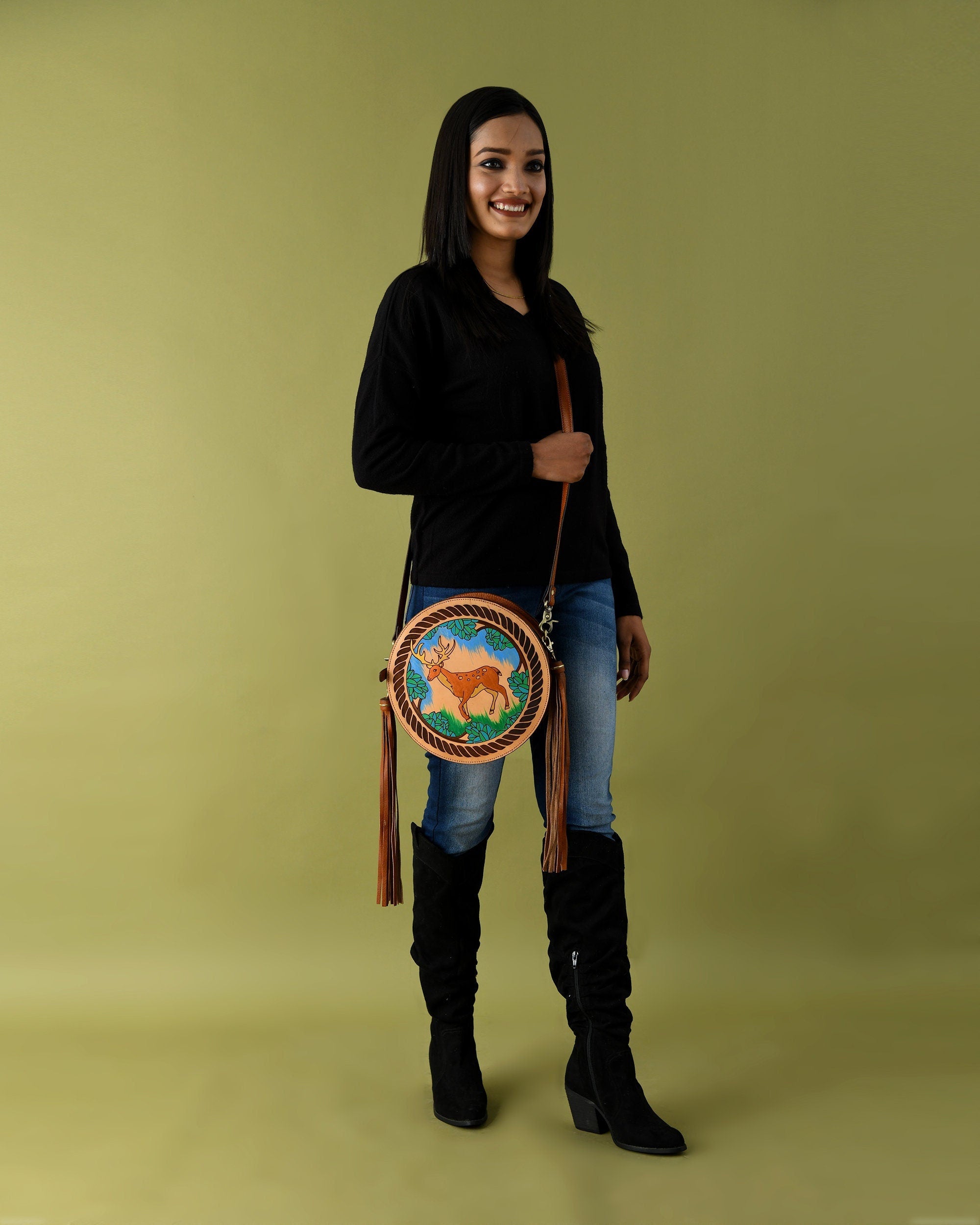 MOUSM Full Grain Cow Hide Leather Crossbody Bag - Small Round Ladies Bag Decorated with Hand-Painted Deer in Forest Carving with Rope Border & Leather Tassel Fringe, High-Quality Zipper Closure with Removable and Adjustable Strap