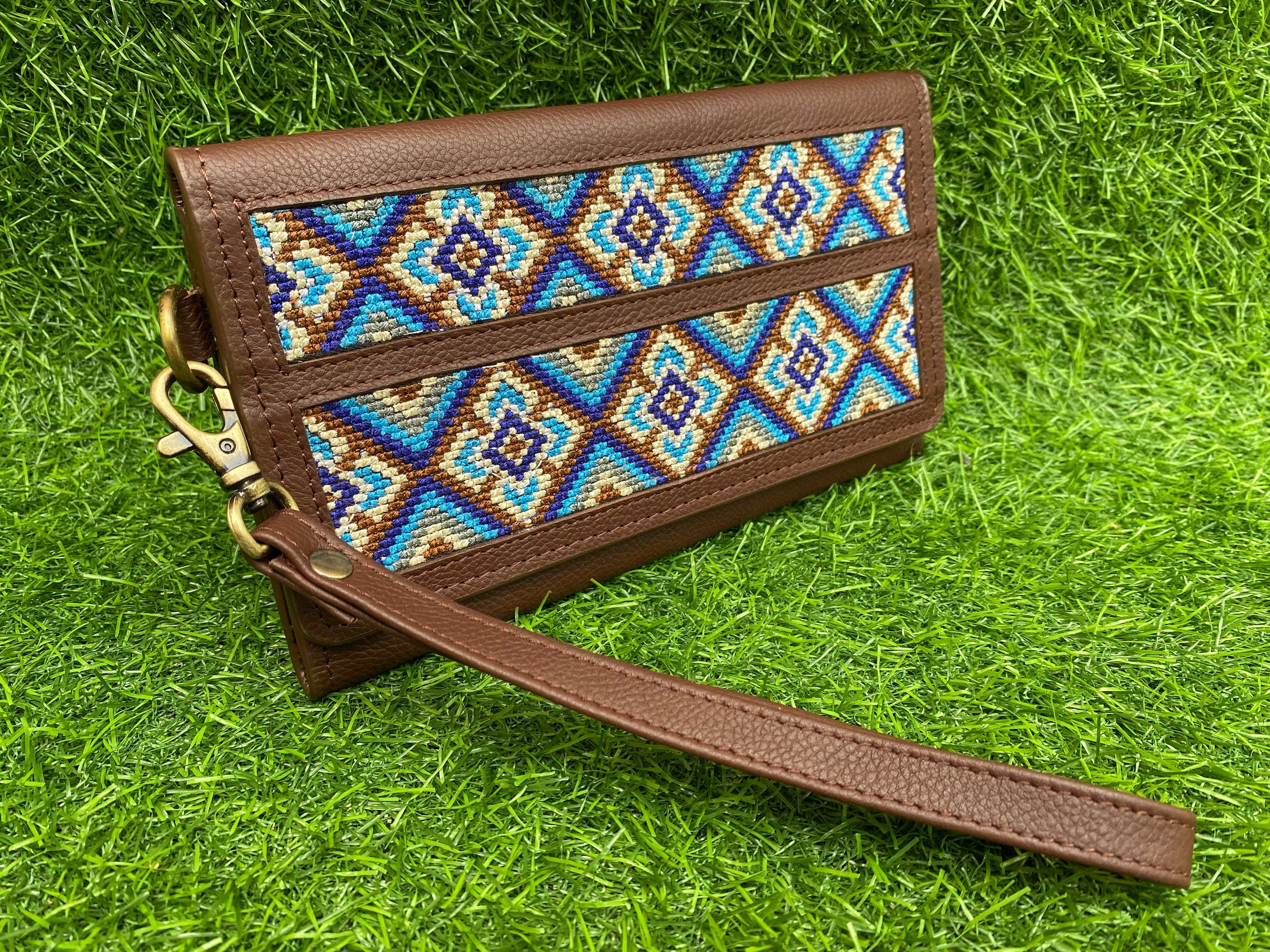 ladies clutch bag comes with Aztec embroidery overlay. Ladies&