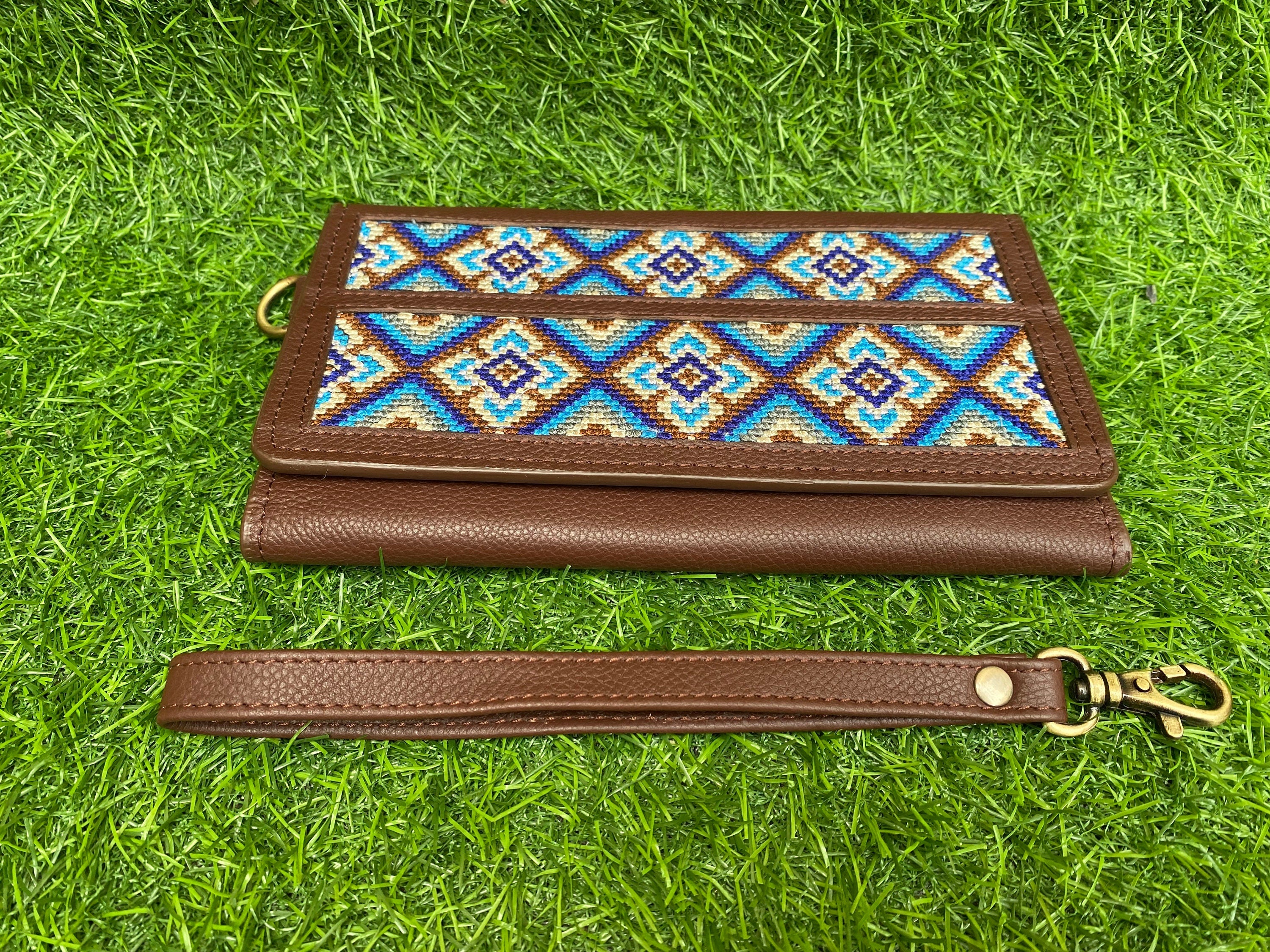 ladies clutch bag comes with Aztec embroidery overlay. Ladies&