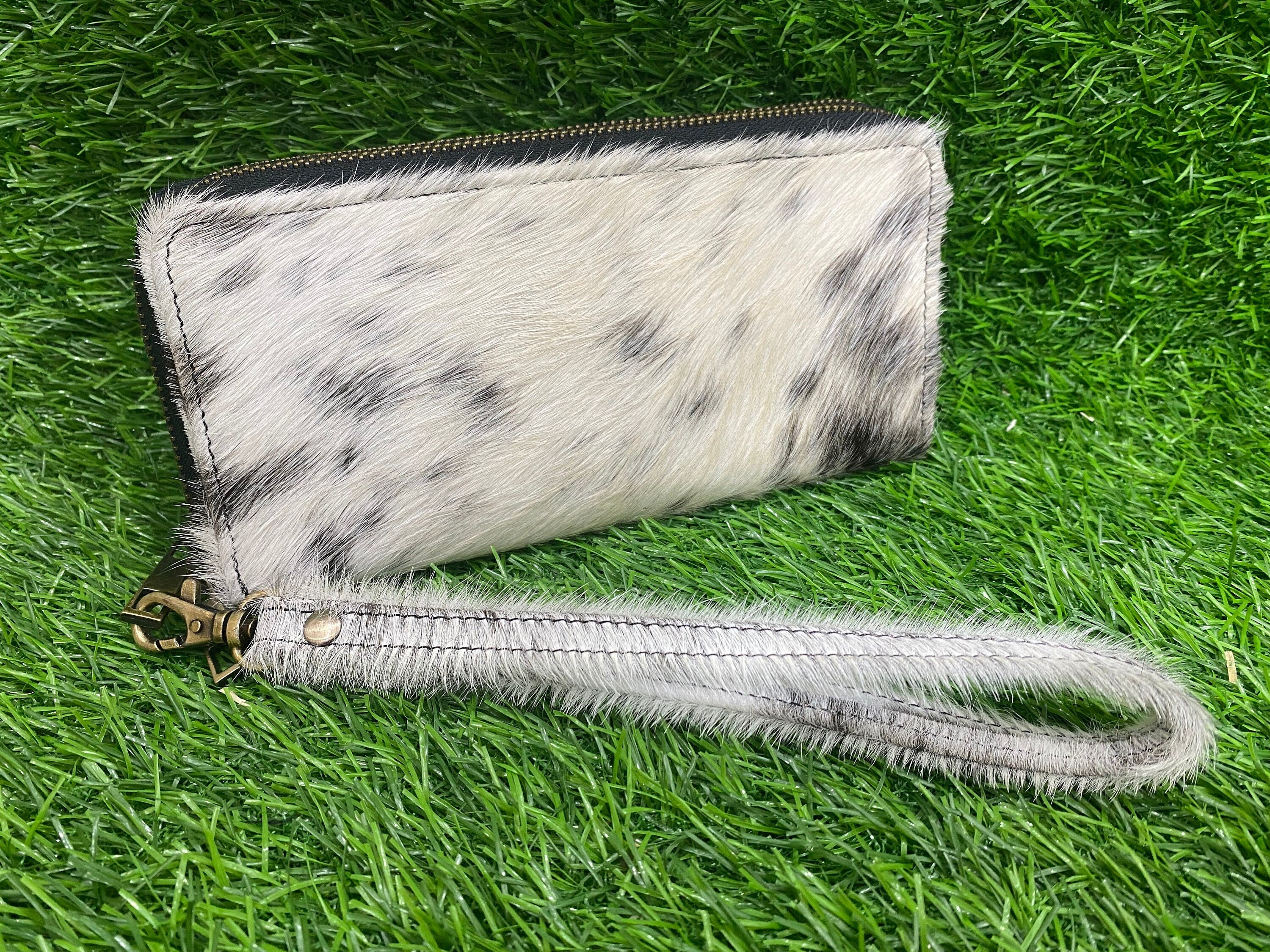 ladies clutch bag comes with black & White hair on. Ladies&