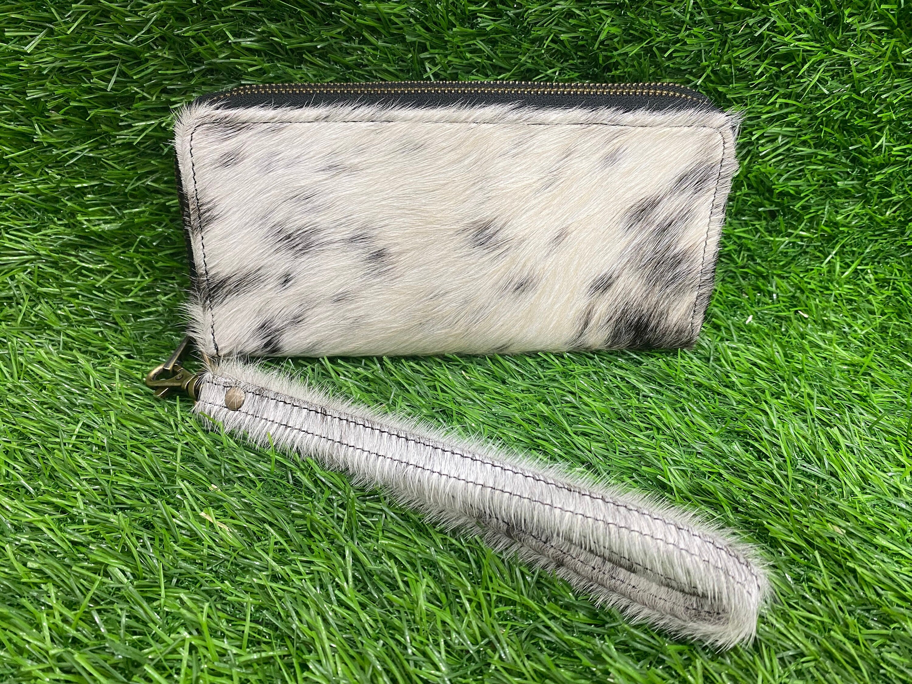 ladies clutch bag comes with black & White hair on. Ladies&