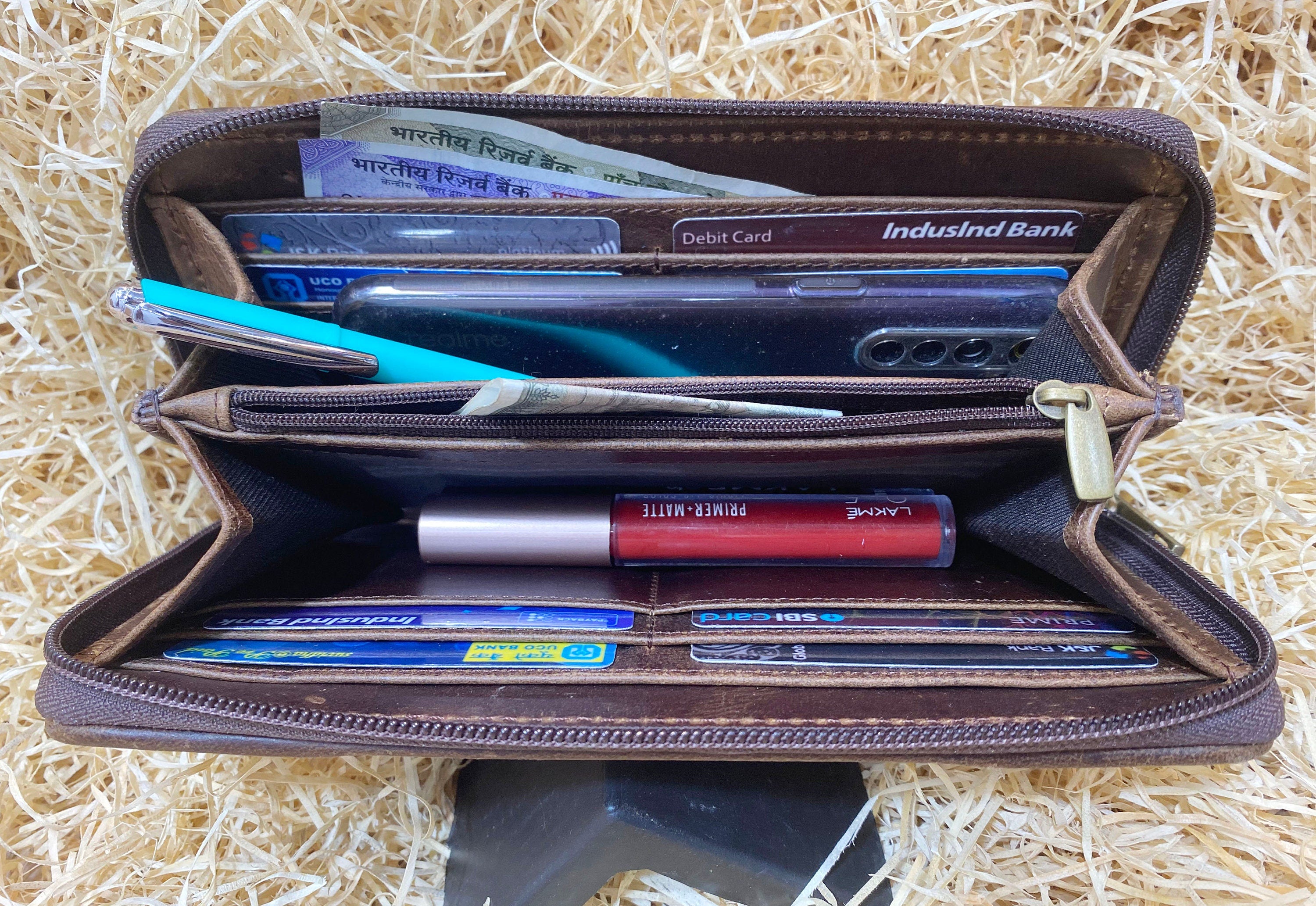 ladies clutch bag comes with Oka fruit carving. Western Ladies hand clutch bag | Premium leather clutch bag by Mousm