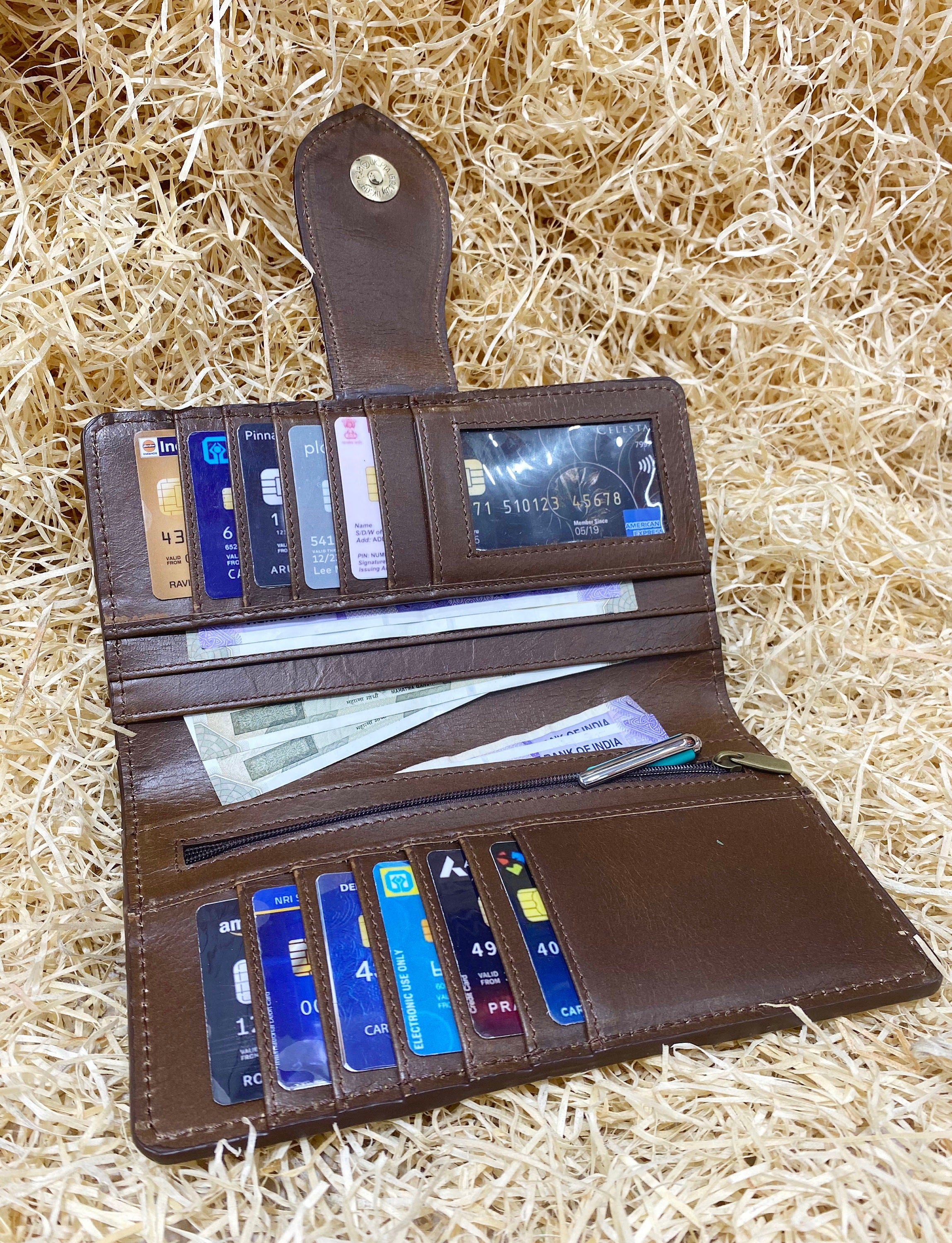 ladies clutch bag comes with leather hand carving patches. Western Ladies hand clutch bag | Premium leather clutch bag by Mousm