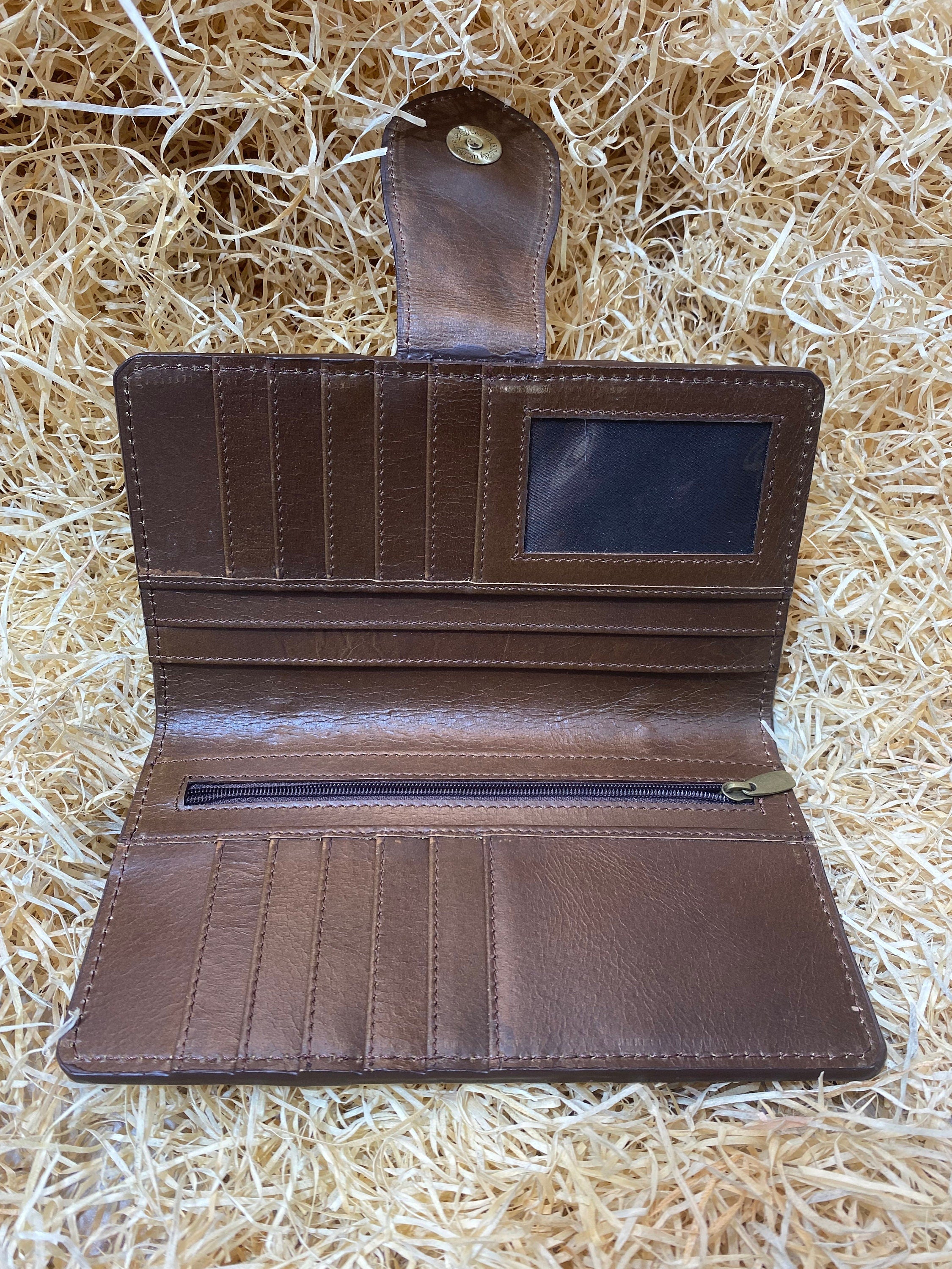 ladies clutch bag comes with leather hand carving patches. Western Ladies hand clutch bag | Premium leather clutch bag by Mousm