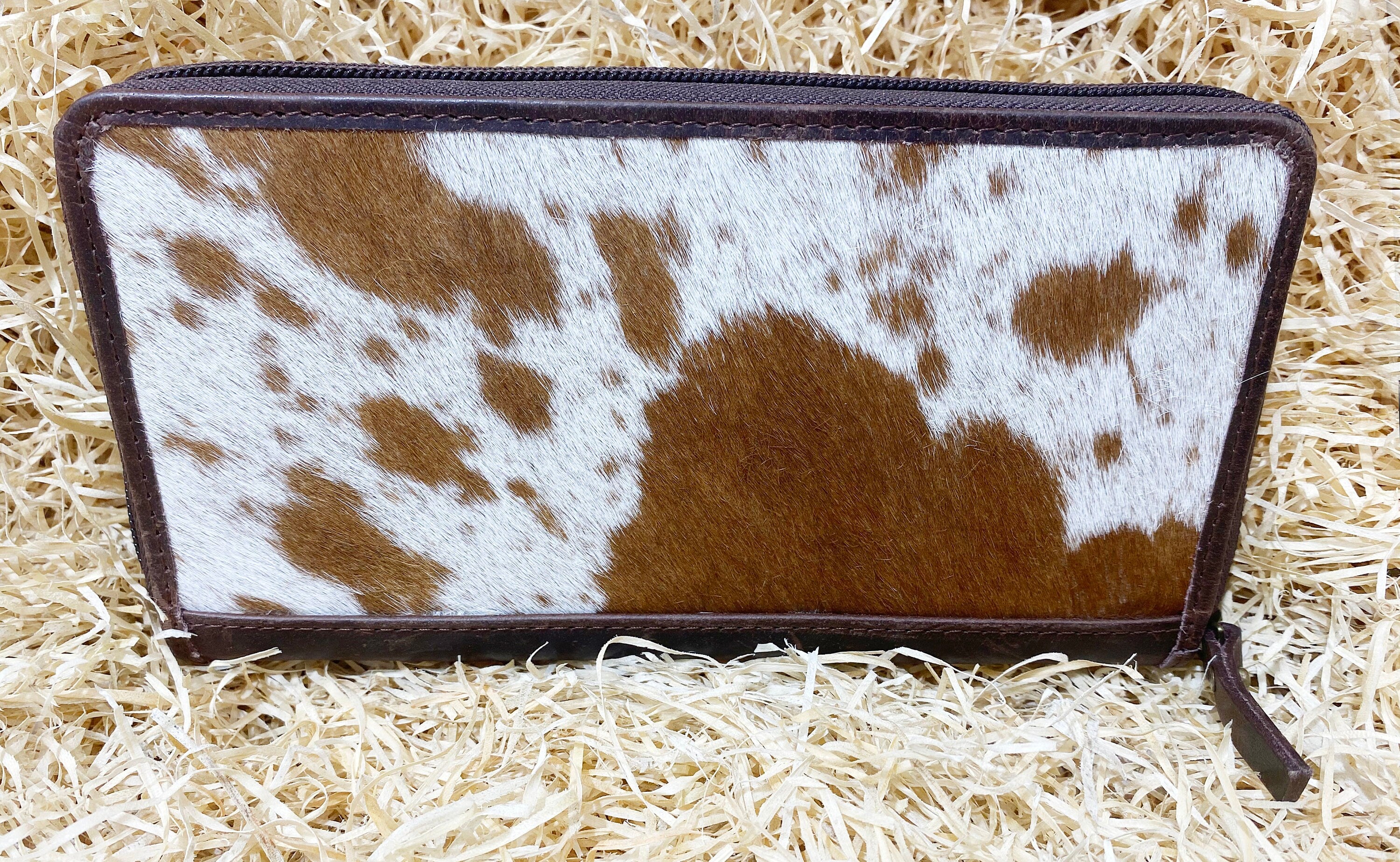 ladies clutch bag comes with Tan and White natural hairon . Western Ladies hand clutch bag | Premium leather clutch bag by Mousm