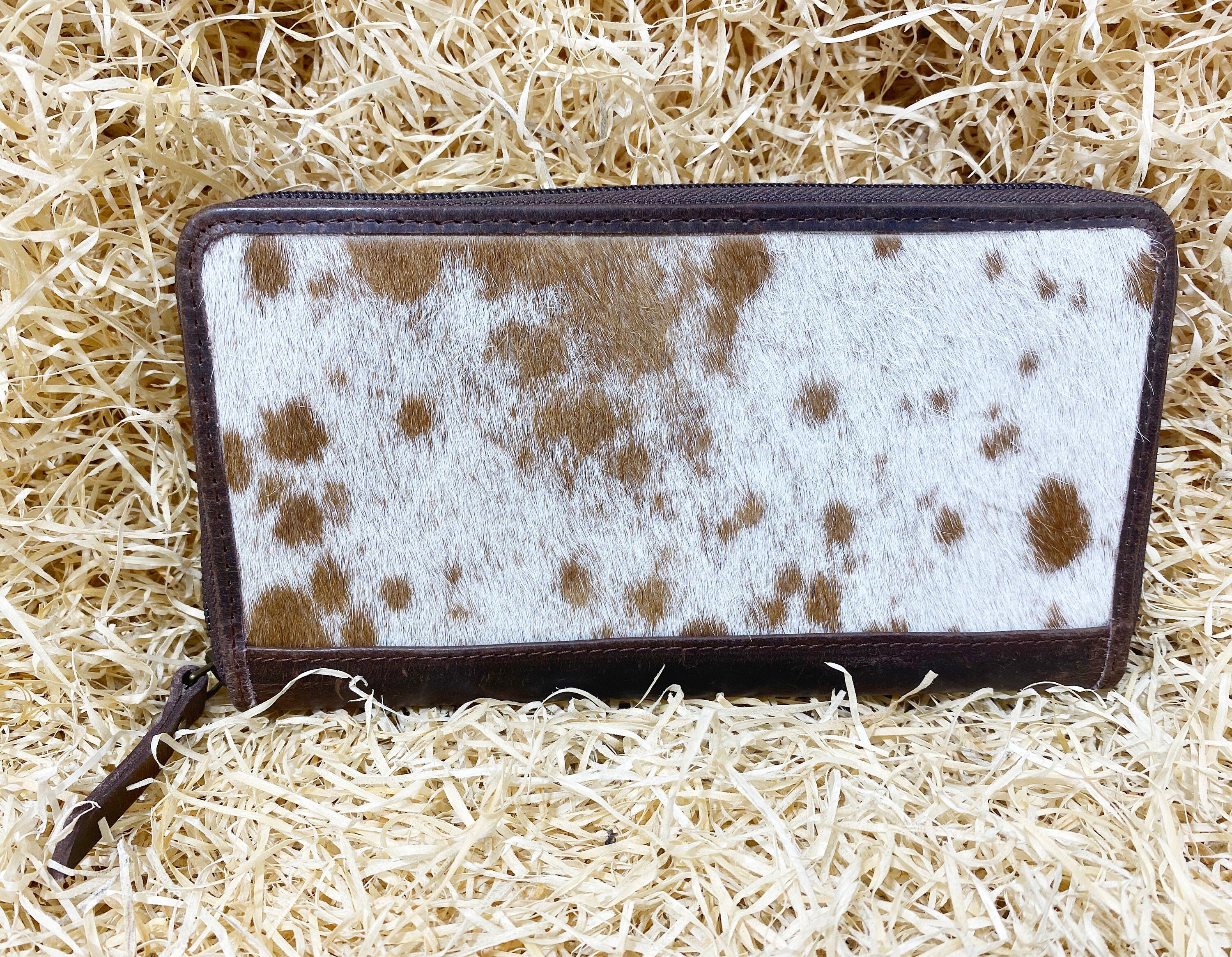 ladies clutch bag comes with Tan and White natural hairon . Western Ladies hand clutch bag | Premium leather clutch bag by Mousm