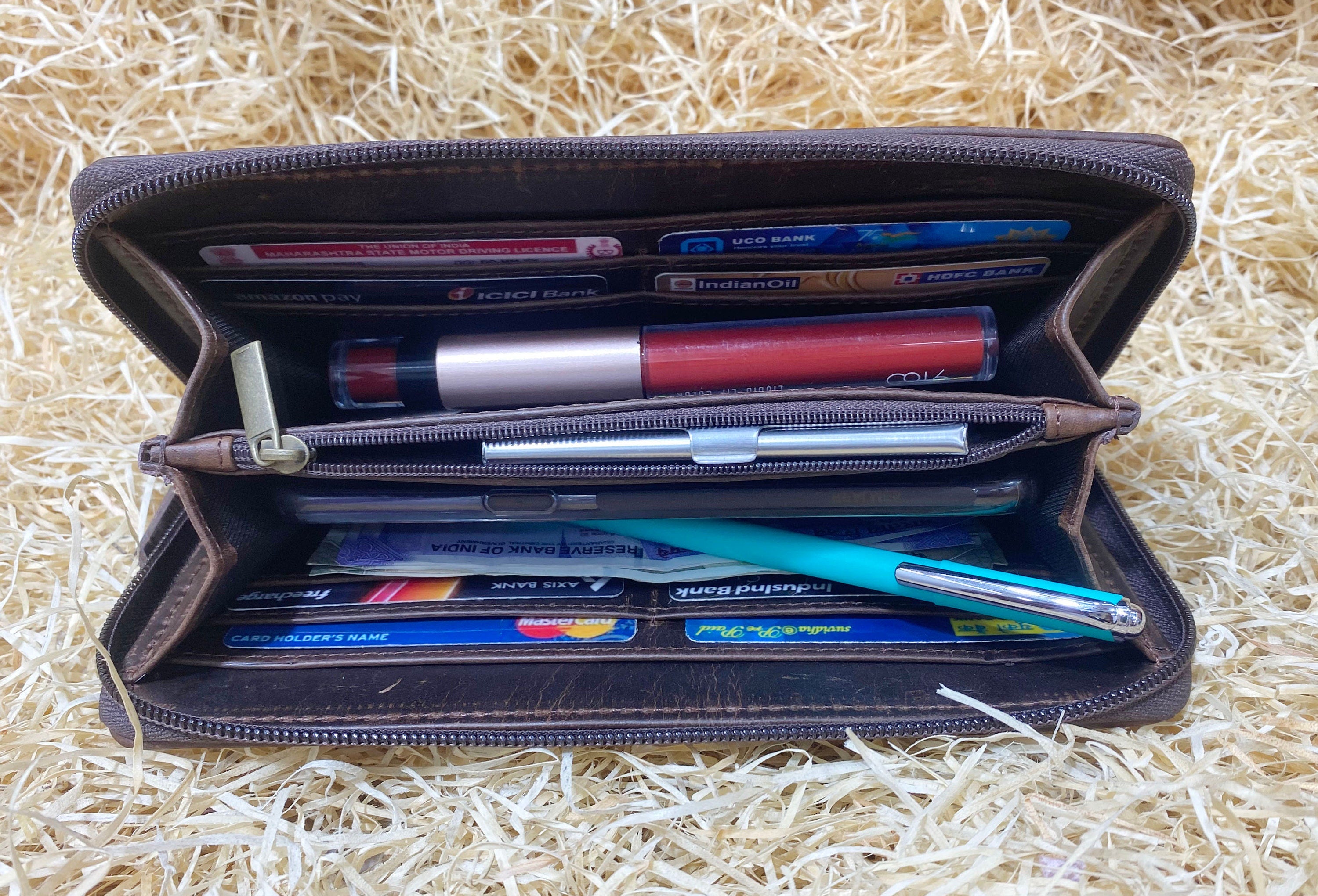 ladies clutch bag comes with Tan and White natural hairon . Western Ladies hand clutch bag | Premium leather clutch bag by Mousm