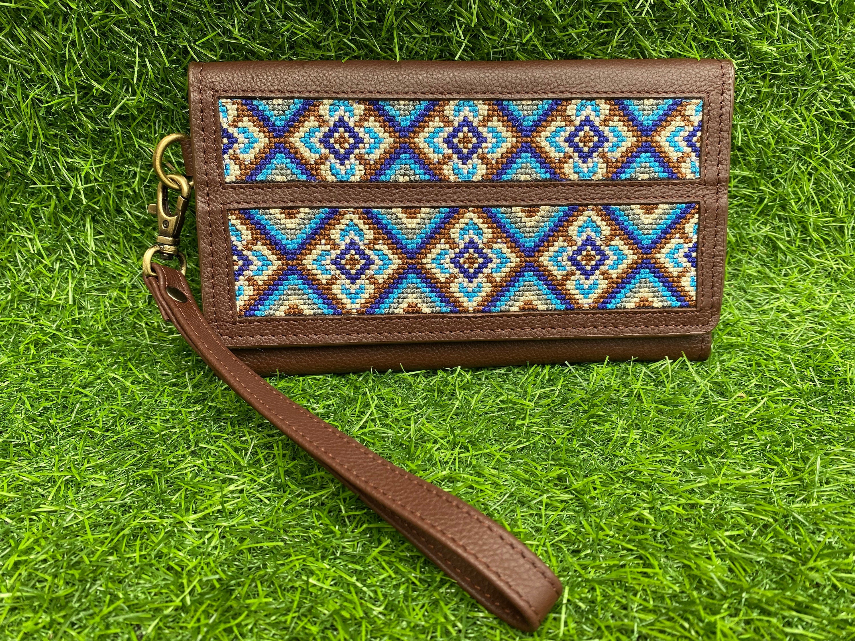 ladies clutch bag comes with Aztec embroidery overlay. Ladies&