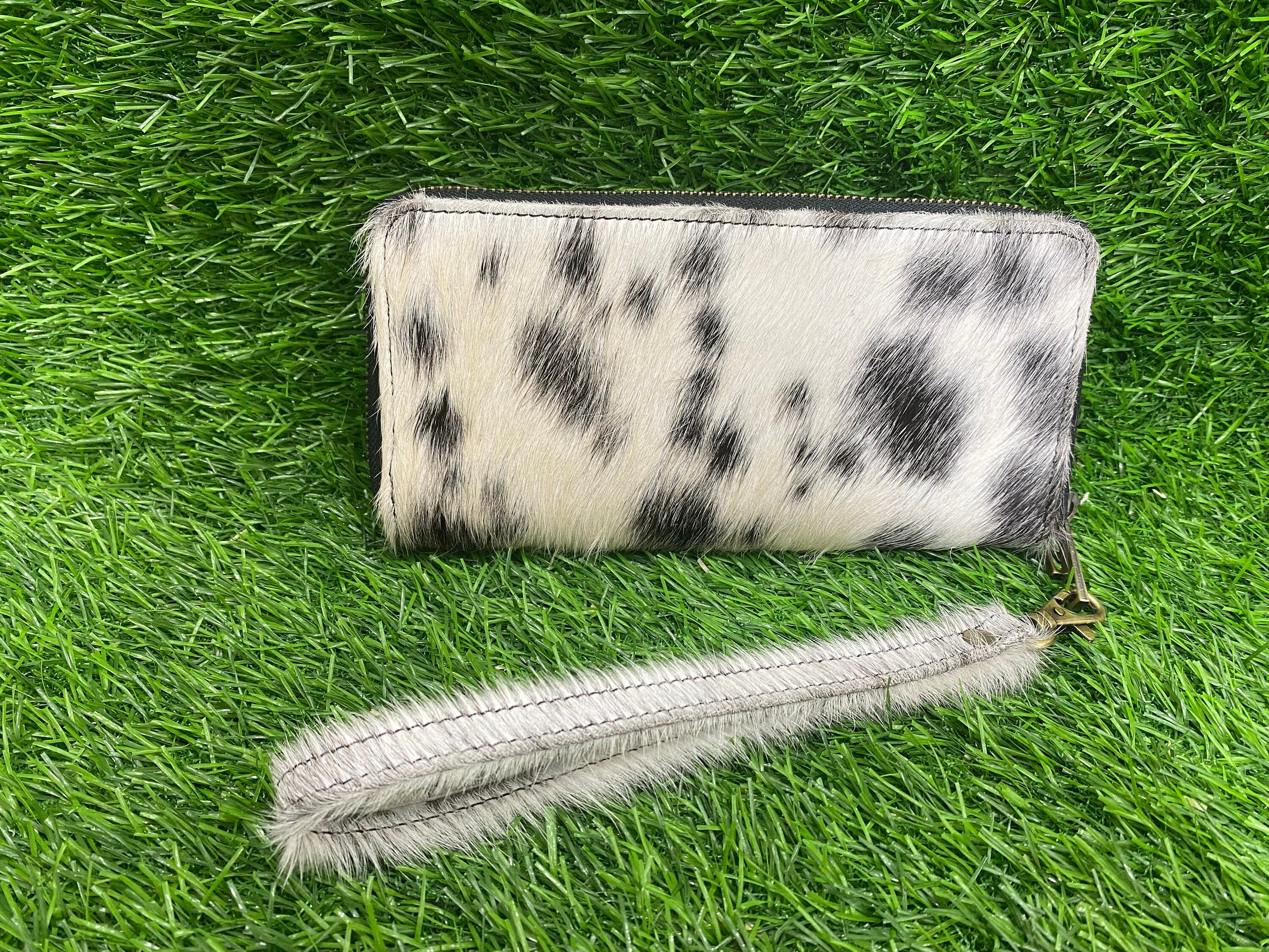 ladies clutch bag comes with black & White hair on. Ladies&