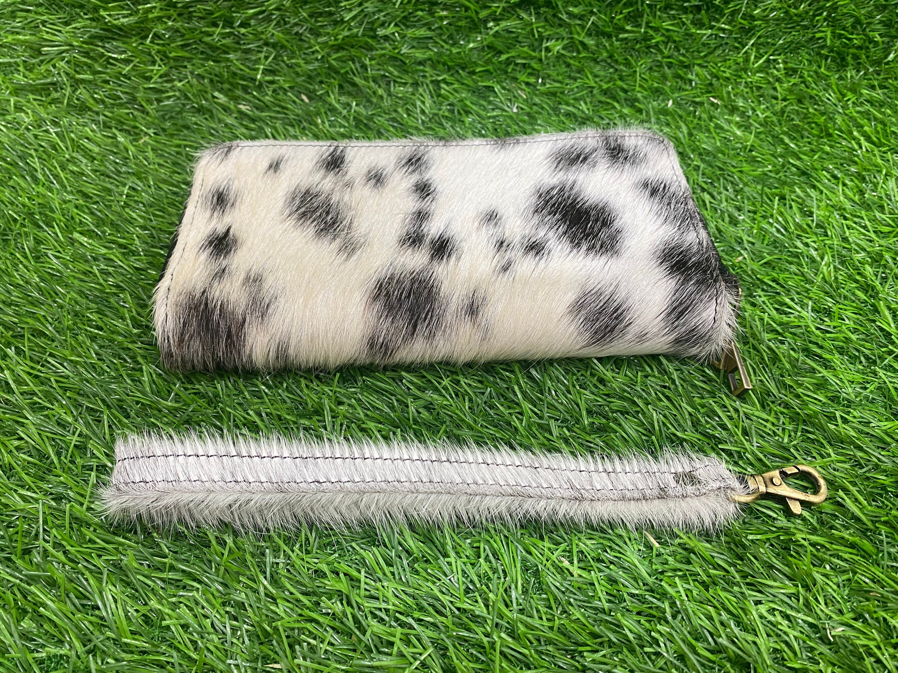 ladies clutch bag comes with black & White hair on. Ladies&