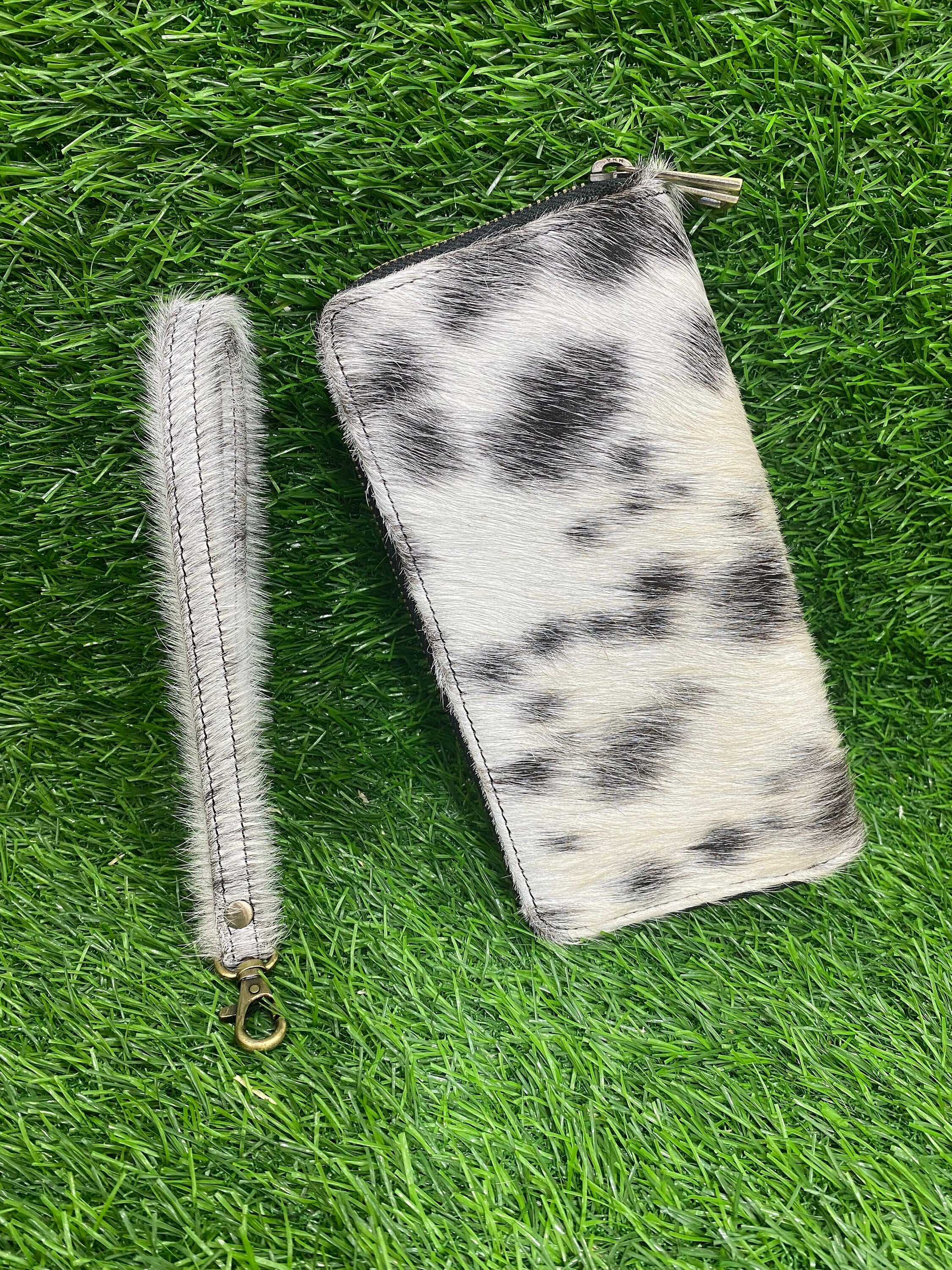 ladies clutch bag comes with black & White hair on. Ladies&
