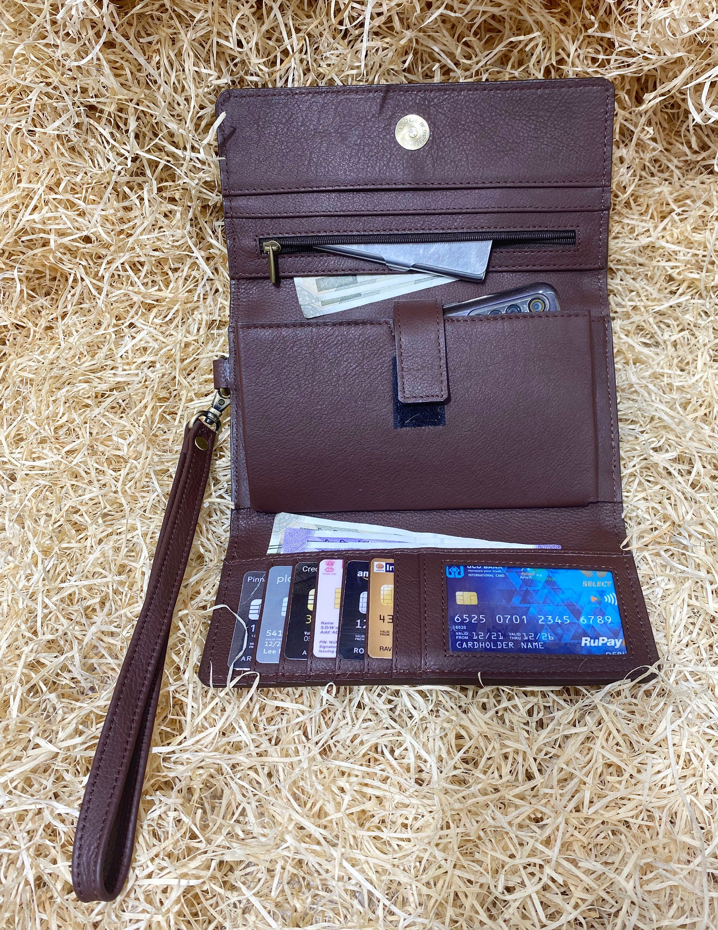 ladies clutch bag comes with real cow hairon overlay. Western Ladies hand clutch bag | Premium leather clutch bag by Mousm