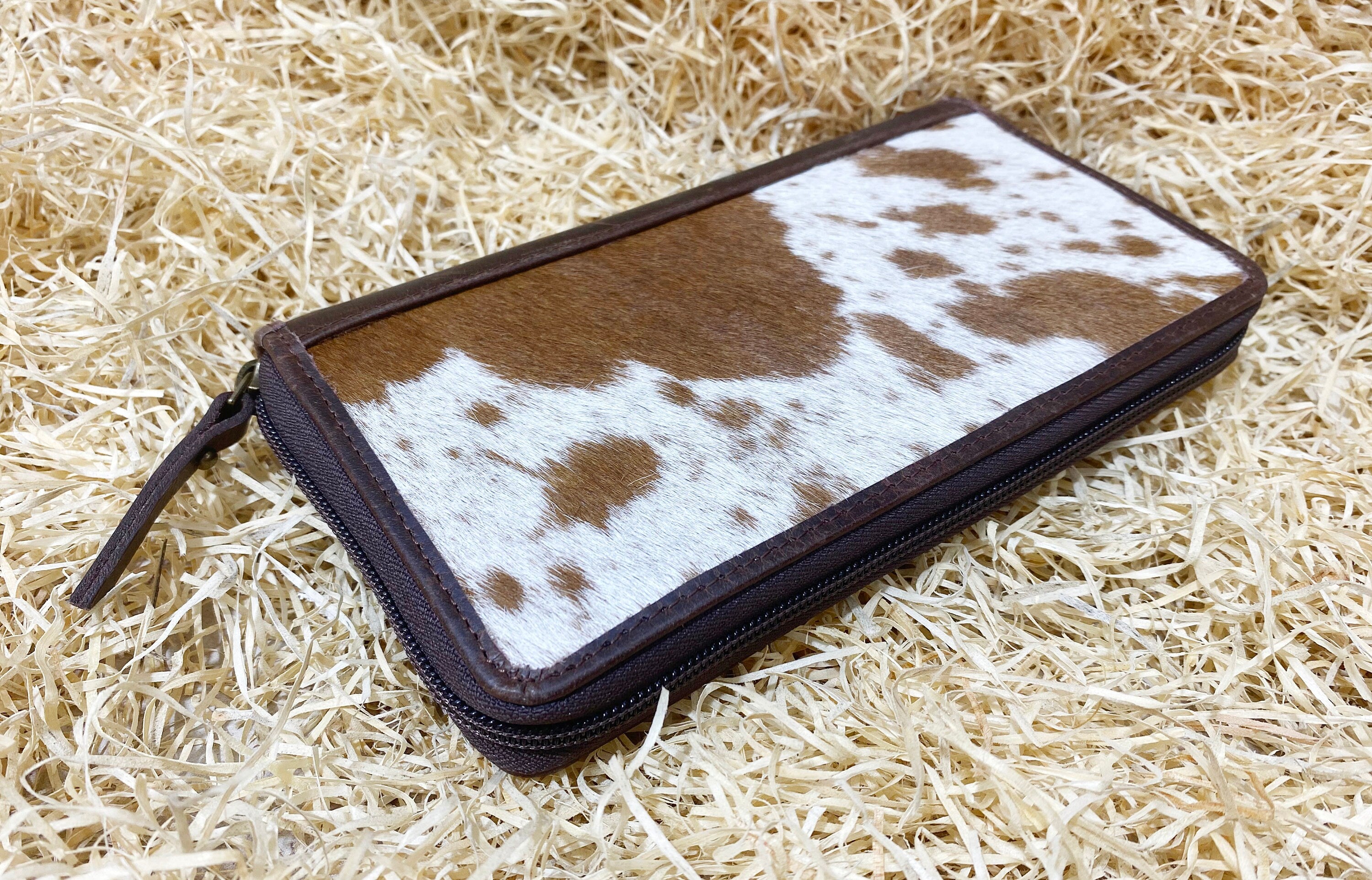 ladies clutch bag comes with Tan and White natural hairon . Western Ladies hand clutch bag | Premium leather clutch bag by Mousm