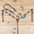 Western headstall and breast collar set with rawhide knotting and 3D golden Dollar conchos