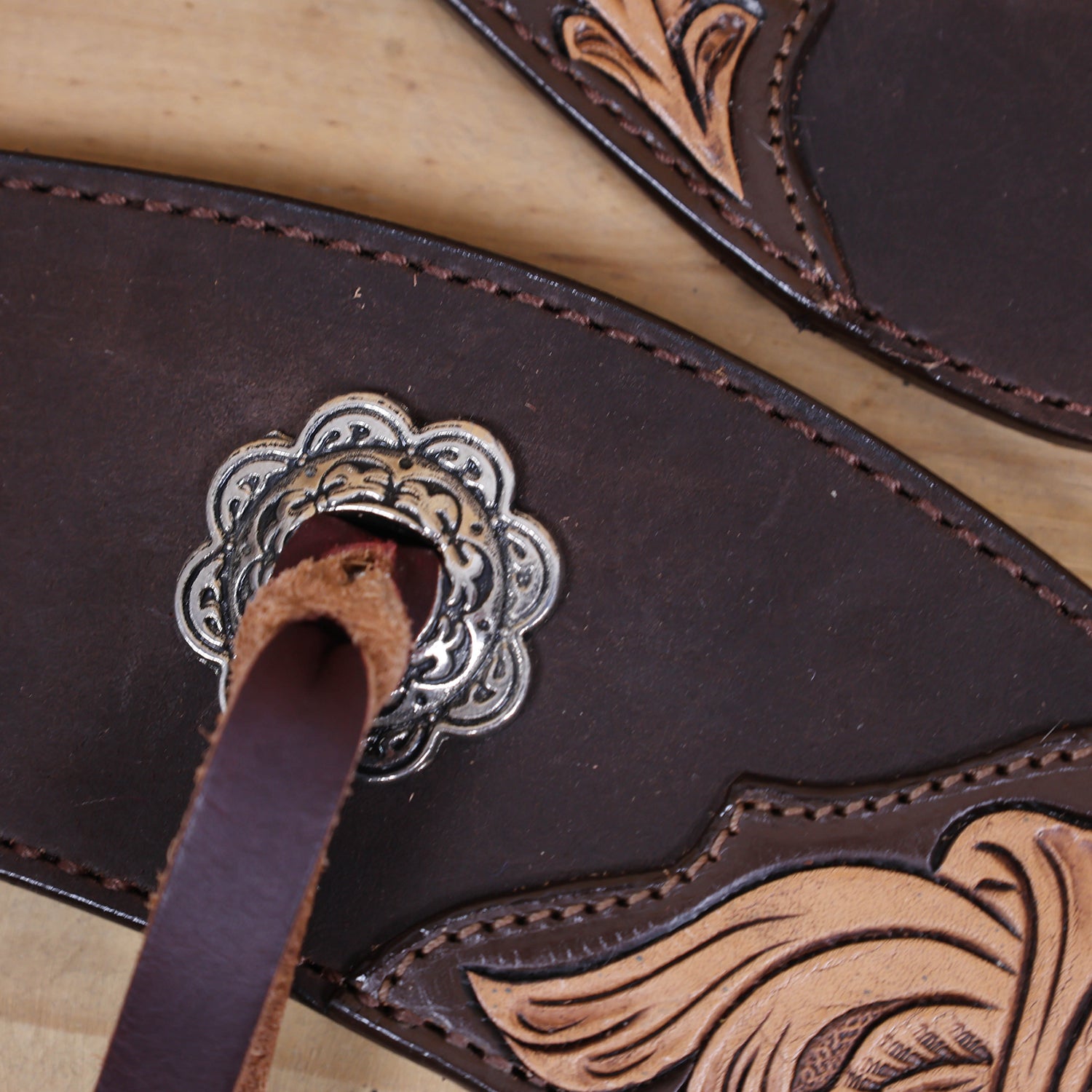 antique nickel slot conchos and burgundy leather accents