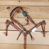 western leather headstall and breast collar set with burgundy leashes and basket tooling