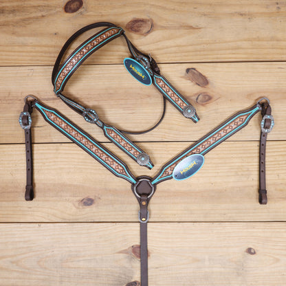 geometrical tooled western horse tack set with turquoise border detailing and  sunburst conchos