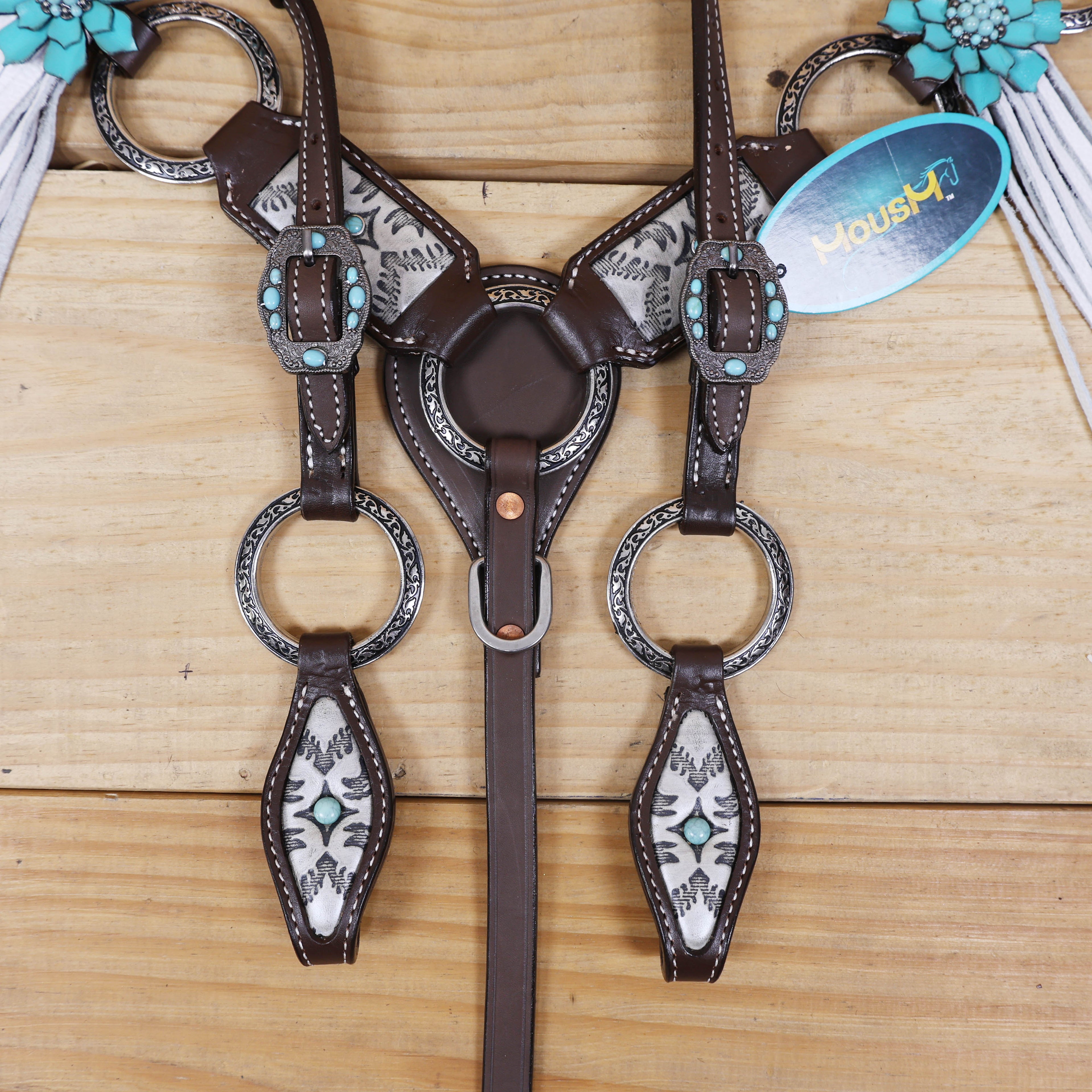 leather cheekpieces with engraved metal rings 