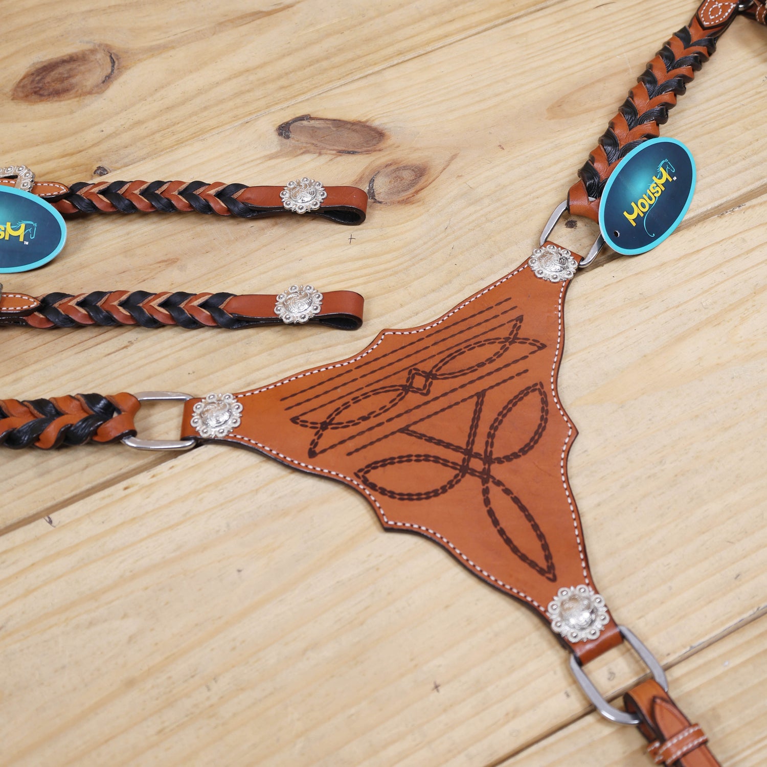 gladiator breast collar with cowboy boot engraving  and twisted leather braiding