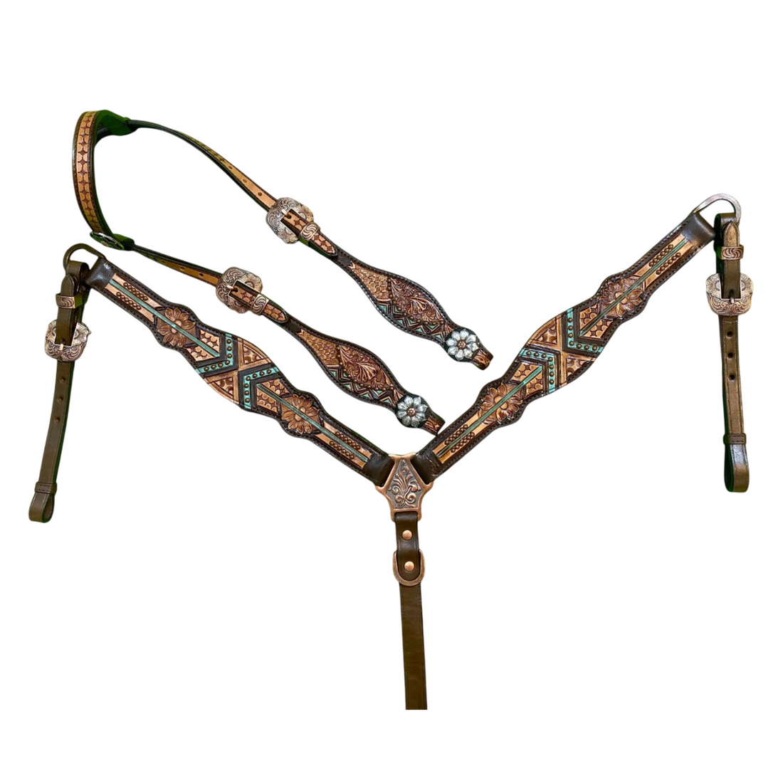 Decorative horse bridle with intricate patterns on a white background