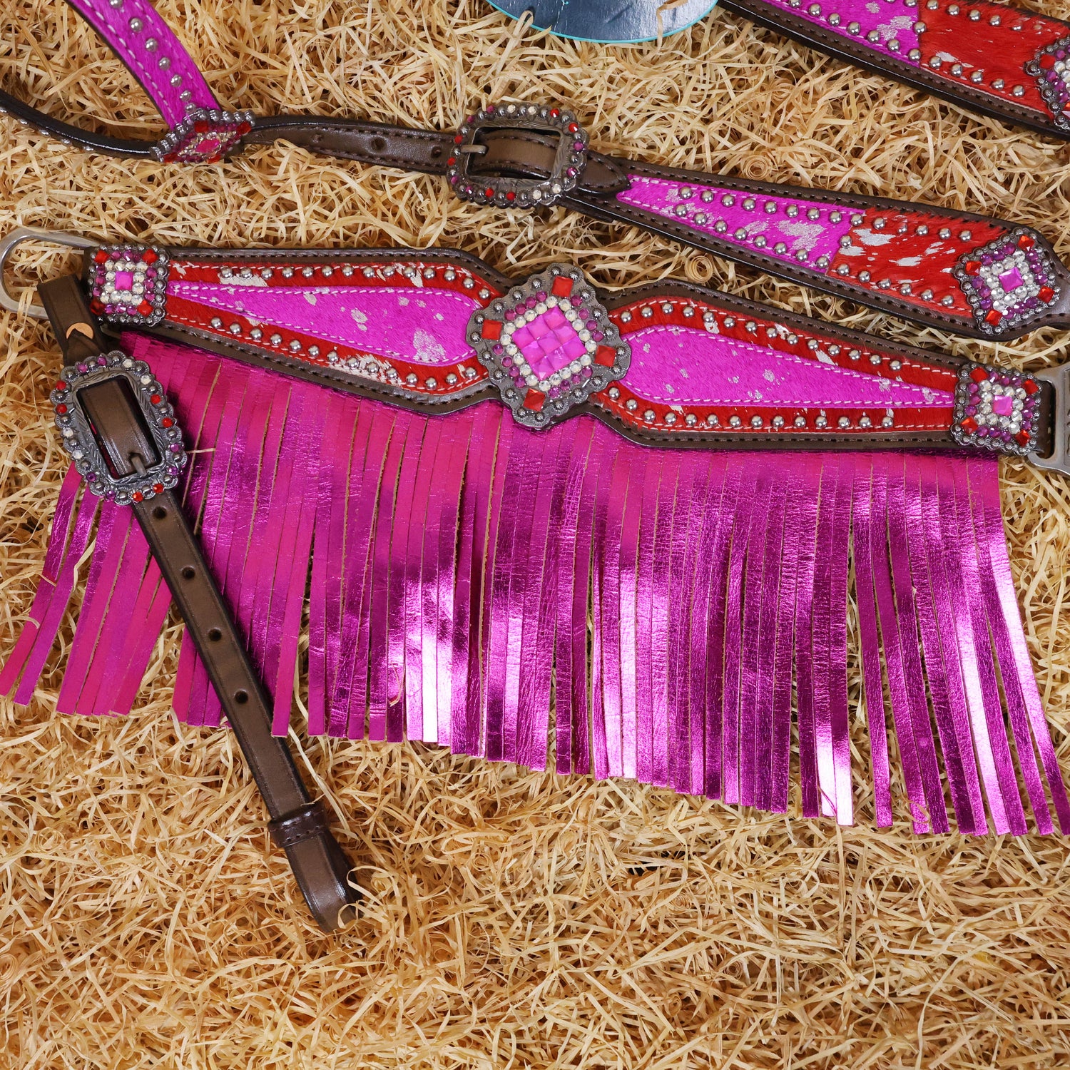 MOUSM Western Headstall and Breast Collar Set Decorated with Red-Pink Cowhide Inlay, Silver Patches Surrounded by Metal Beads, Matching Rhinestone Conchos, and Pink Metallic Leather Fringe