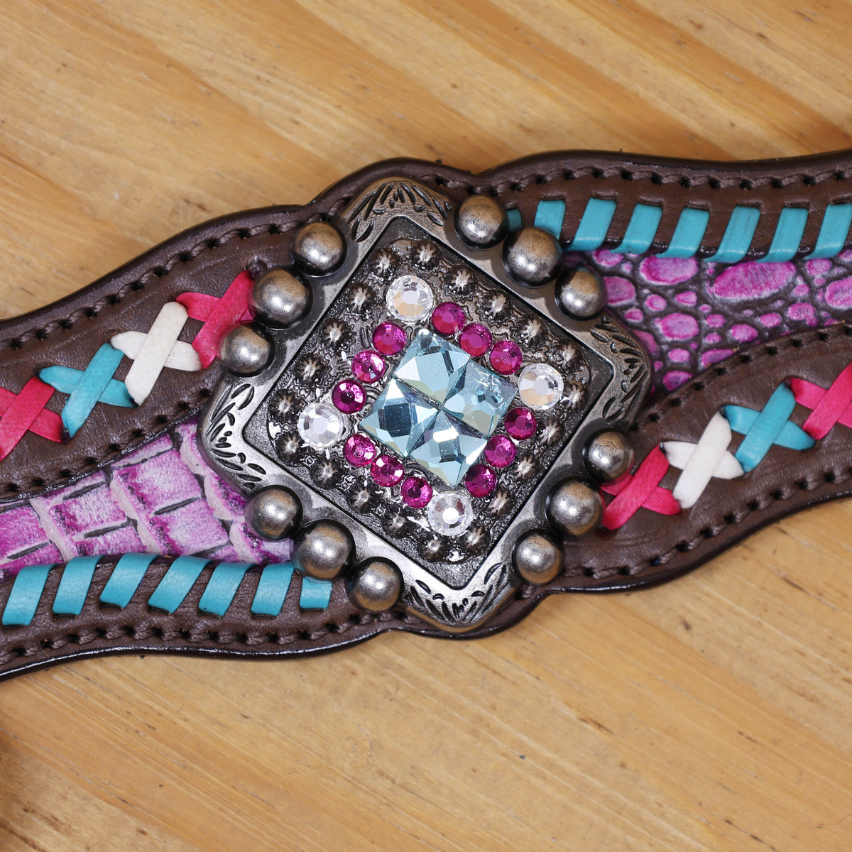 Western Leather Headstall and Breast Collar tack Set decorated with  Big Bling Conchos and Pink teal white raw hide braiding with pink alligator inlay