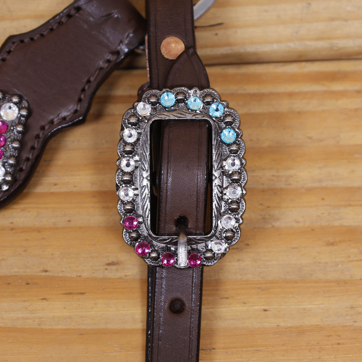 Western Leather Headstall and Breast Collar tack Set decorated with  Big Bling Conchos and Pink teal white raw hide braiding with pink alligator inlay