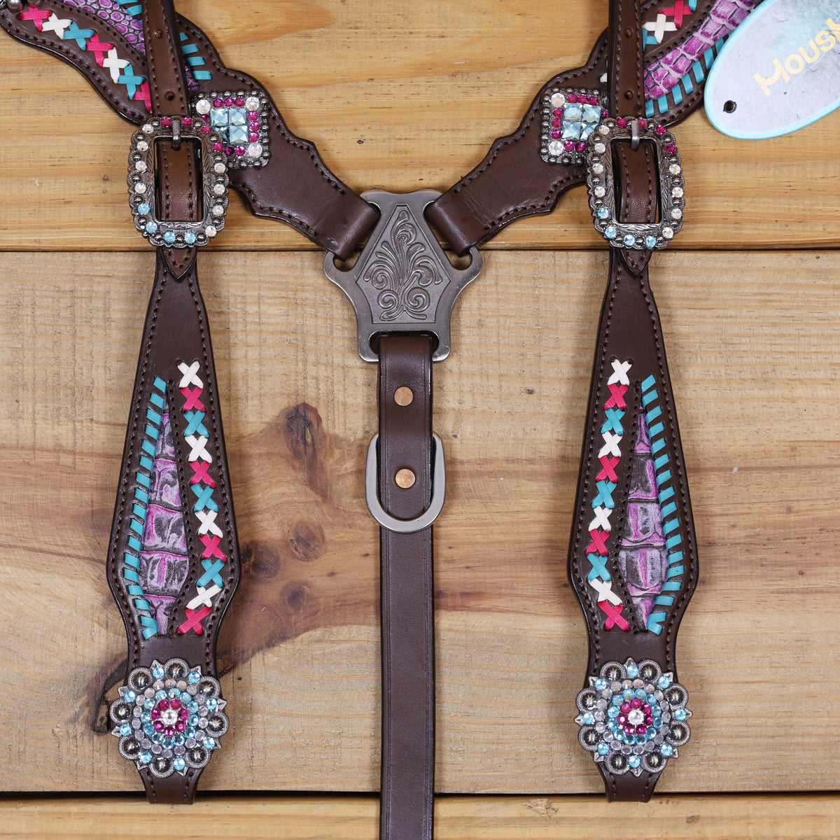 Western Leather Headstall and Breast Collar tack Set decorated with  Big Bling Conchos and Pink teal white raw hide braiding with pink alligator inlay