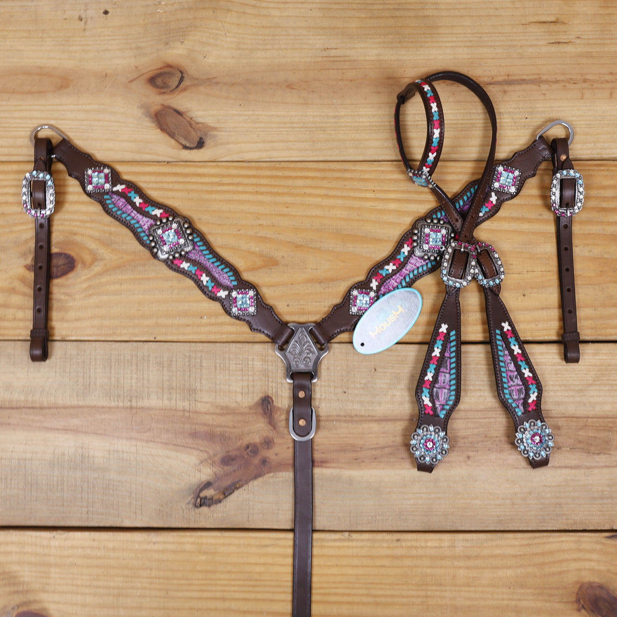 Western Leather Headstall and Breast Collar tack Set decorated with  Big Bling Conchos and Pink teal white raw hide braiding with pink alligator inlay