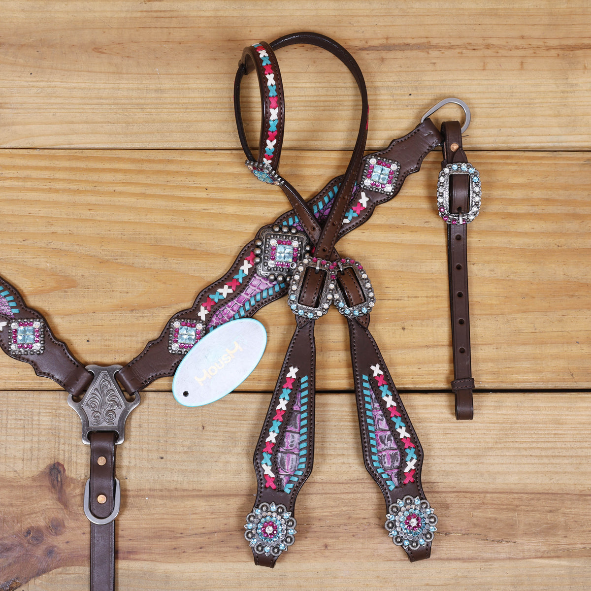 Western Leather Headstall and Breast Collar tack Set decorated with  Big Bling Conchos and Pink teal white raw hide braiding with pink alligator inlay