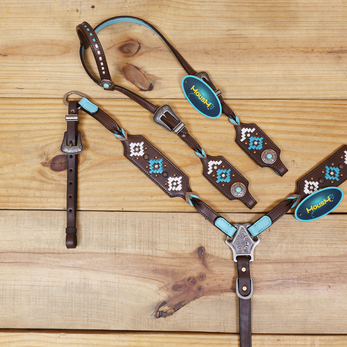 Western Leather Headstall and Breast Collar tack Set decorated with  Aztec-style rawhide braiding on breast collar and cheek pieces, and twisted braided breast collar and cheek piece