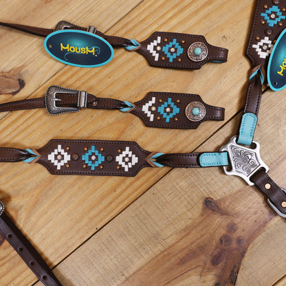 Western Leather Headstall and Breast Collar tack Set decorated with  Aztec-style rawhide braiding on breast collar and cheek pieces, and twisted braided breast collar and cheek piece