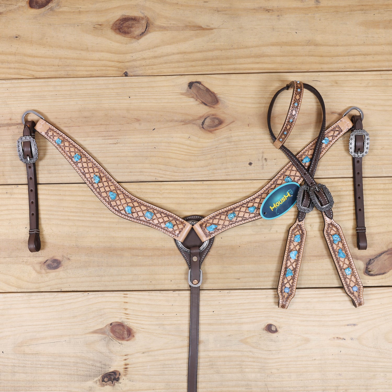 handcrafted western horse tack set with detailed window tooling and antique finish