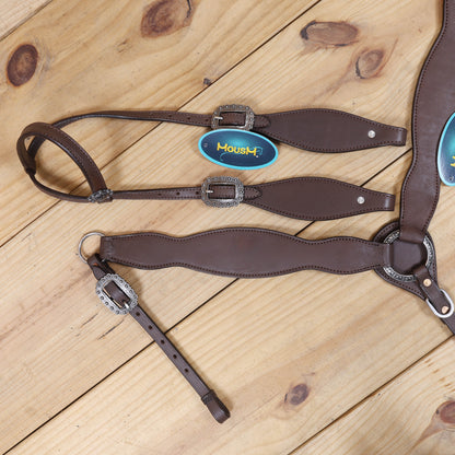 rustic handcrafted western horse tack with plain brown leather and durable hardware