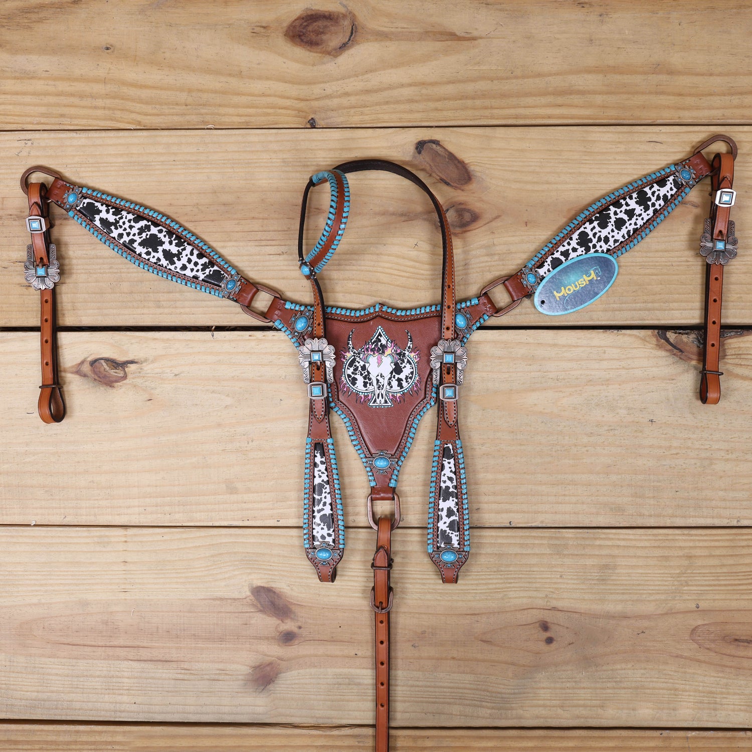 western headstall and breast collar with one ear design and cowhide print and steer head print