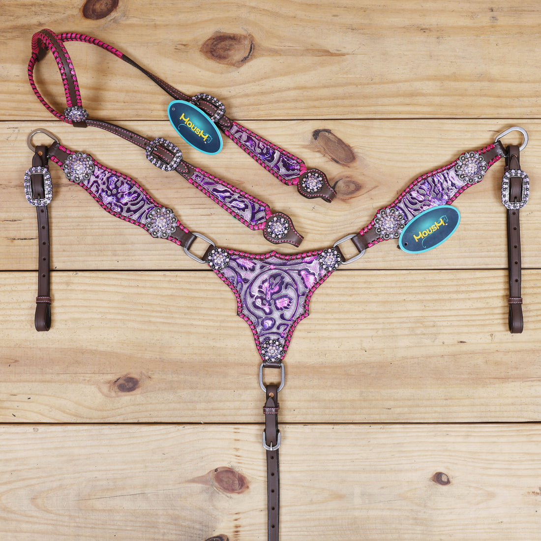 western headstall and breast collar set featuring pink and purple flower embossed leather with whip stitching 