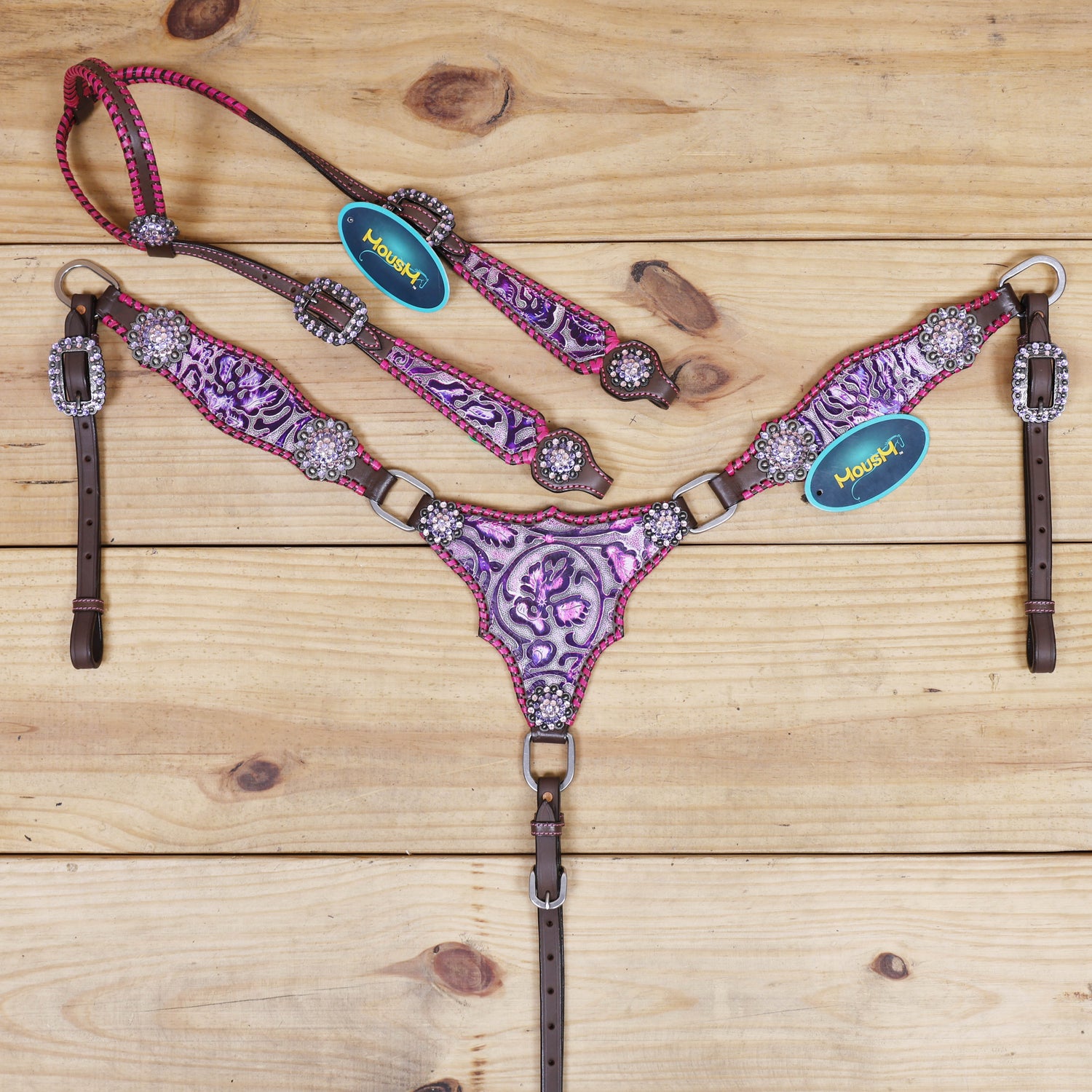 western headstall and breast collar set featuring pink and purple flower embossed leather with whip stitching 