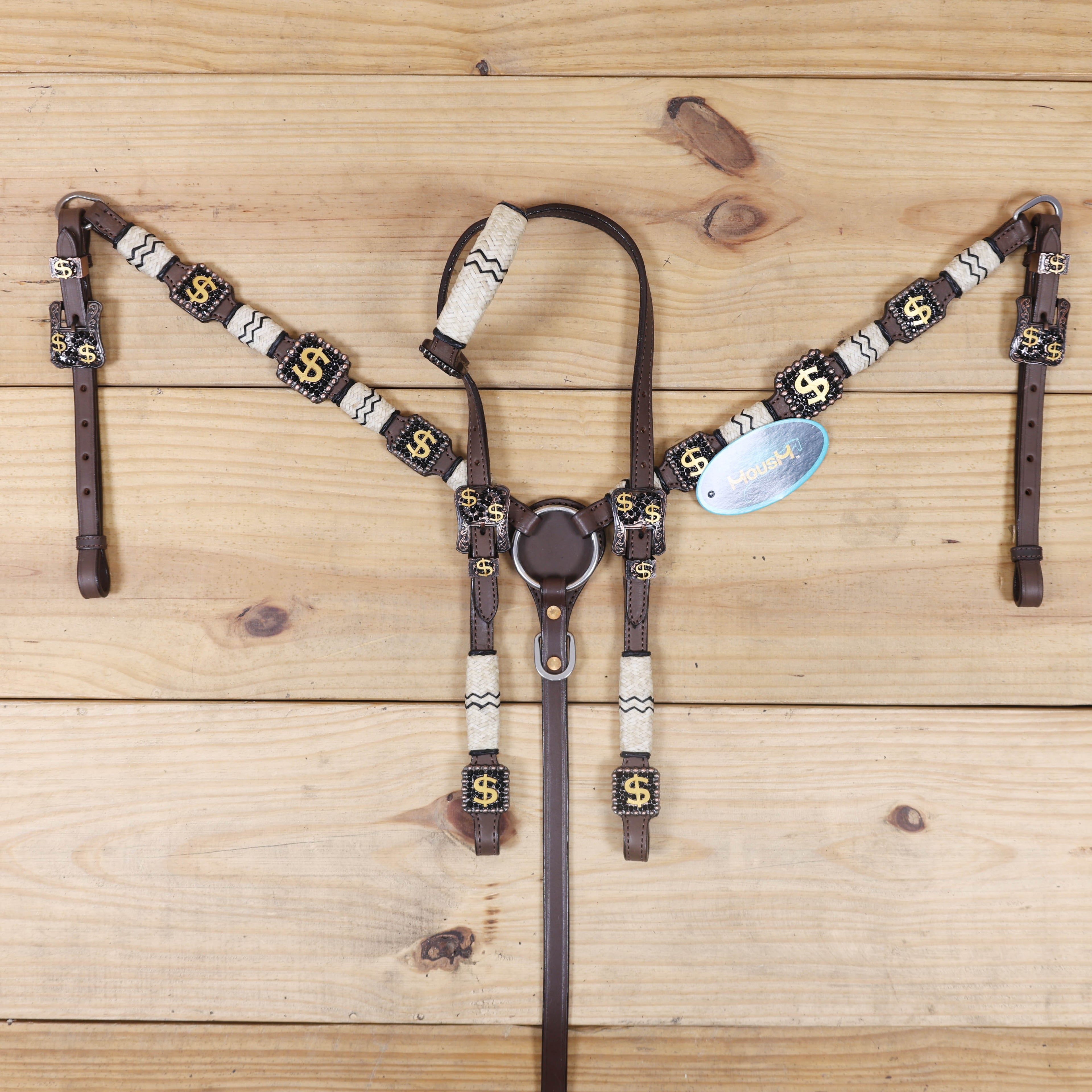 black leather headstall and breast collar with rawhide knotting and antique copper finish
